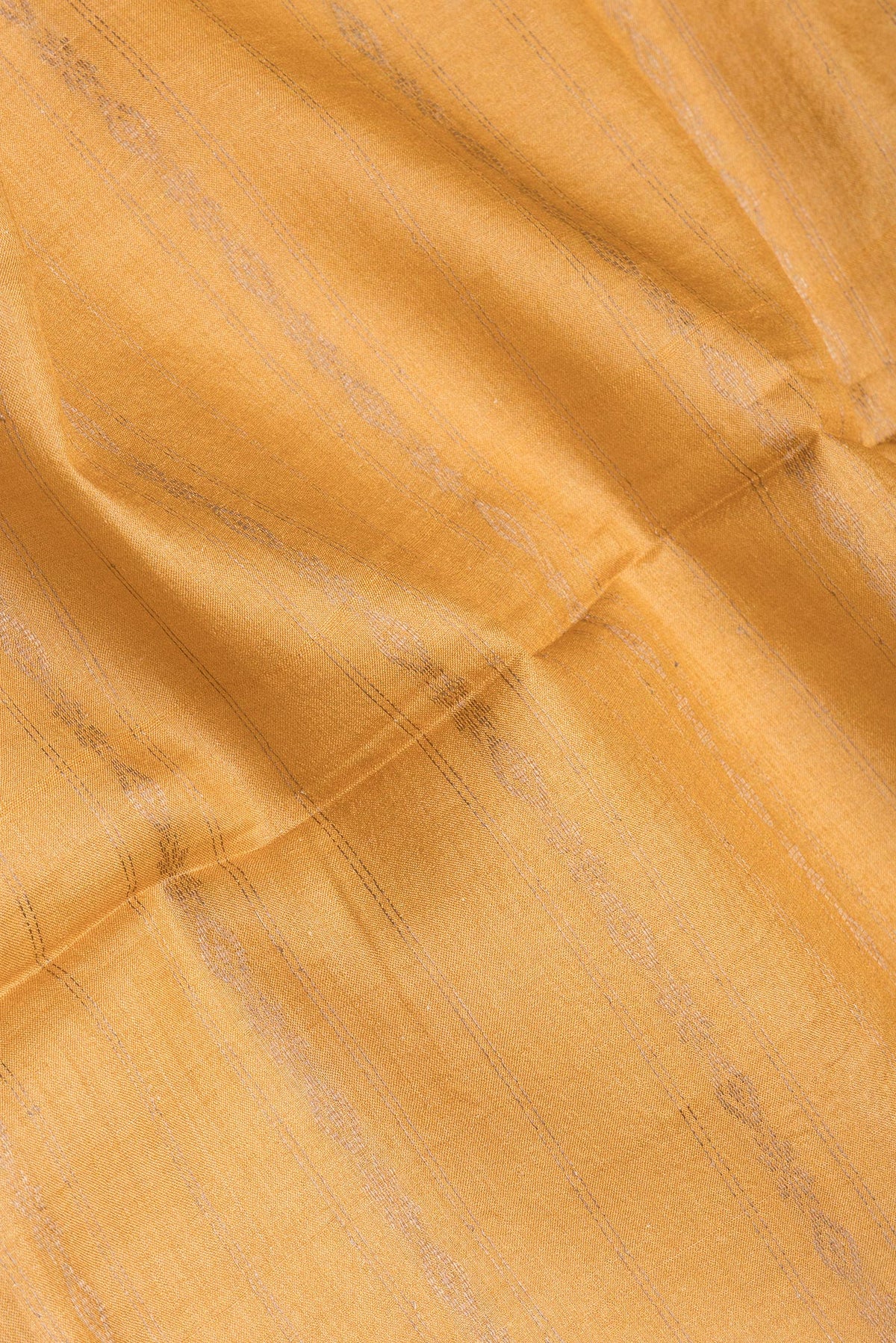 Close up of Sandal Tussar Silk Saree with Stripes on the body and Fancy Border.  displaying folds
