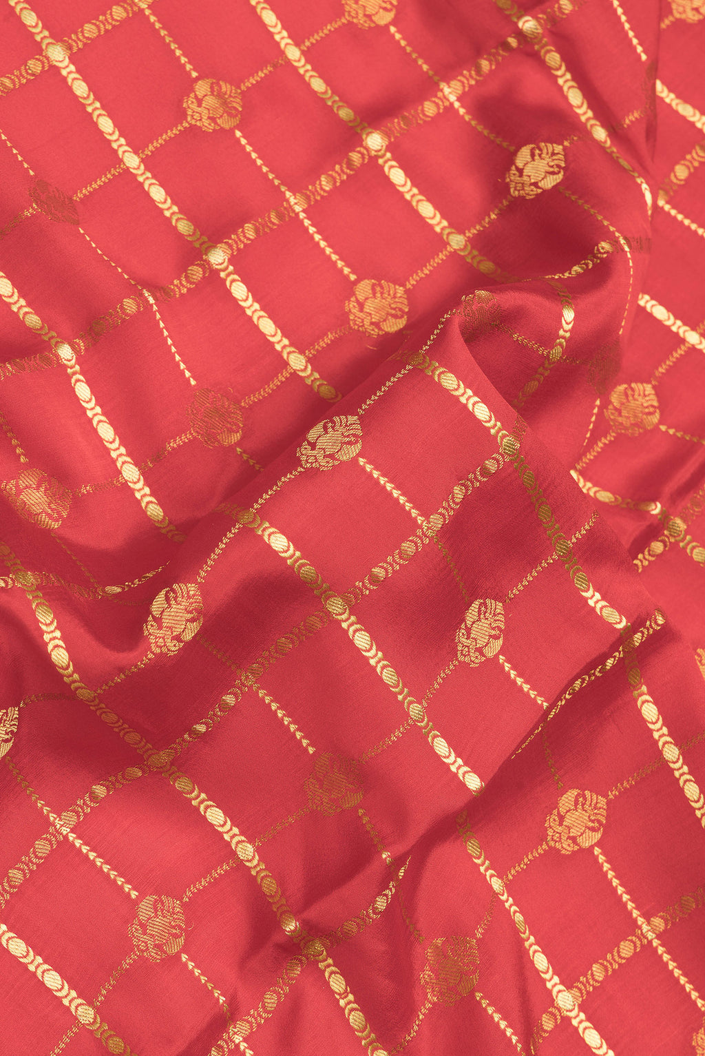 Close up of Red Dual Tone Mysore Silk Saree with Checked design on the body and Zari Border.  displaying folds