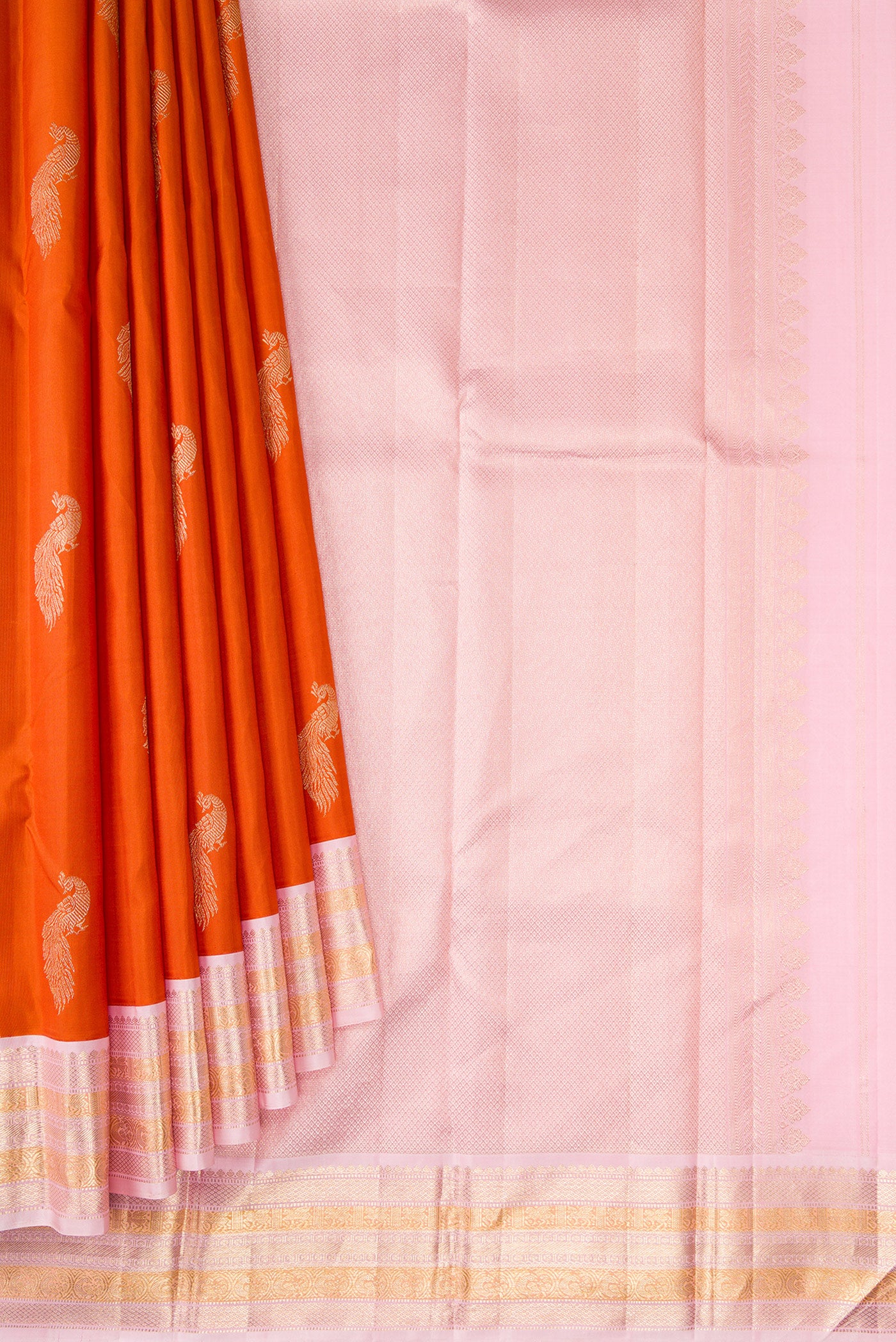 Pleats and pallu of Pure Silk Pure Zari Brick Orange Dual Tone Kanjivaram Saree with Zari Butta on the body and Zari Border. 