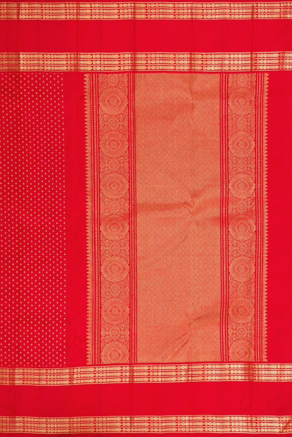 Close up image of the pallu of Pure Silk Pure Zari Red Dual Tone Kanjivaram Saree with Zari Butta on the body and Zari Border. 