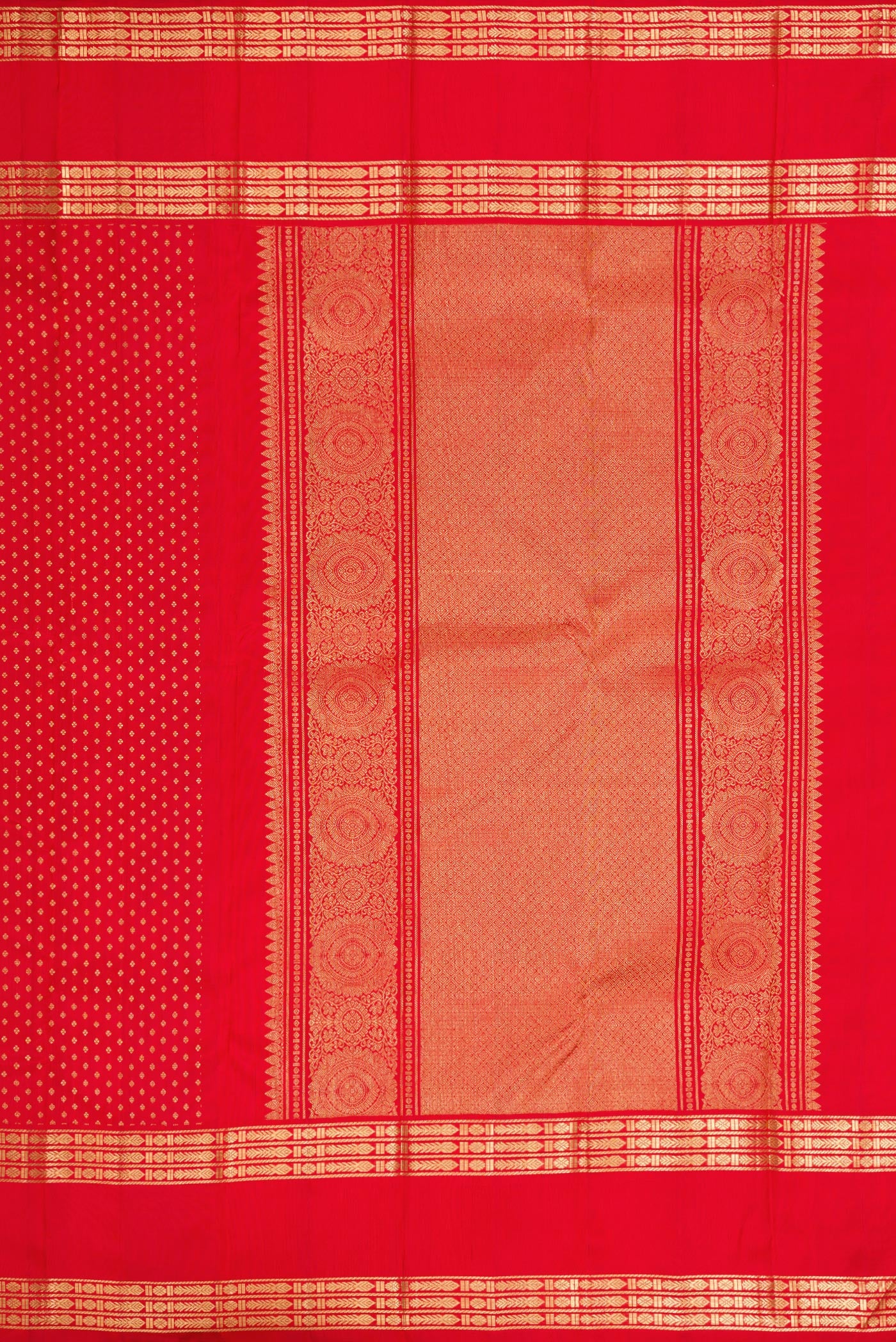 Close up image of the pallu of Pure Silk Pure Zari Red Dual Tone Kanjivaram Saree with Zari Butta on the body and Zari Border. 