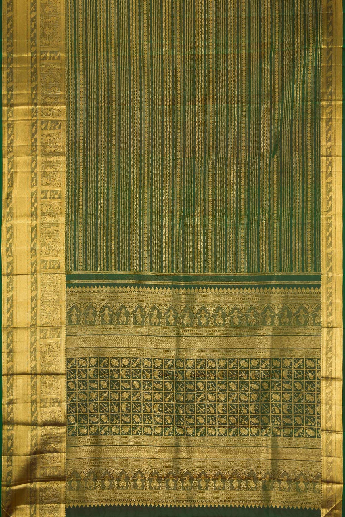 Flat view of Bottle Green Kanchipuram Silk Saree with Zari Brocade on the body and Zari Border. 