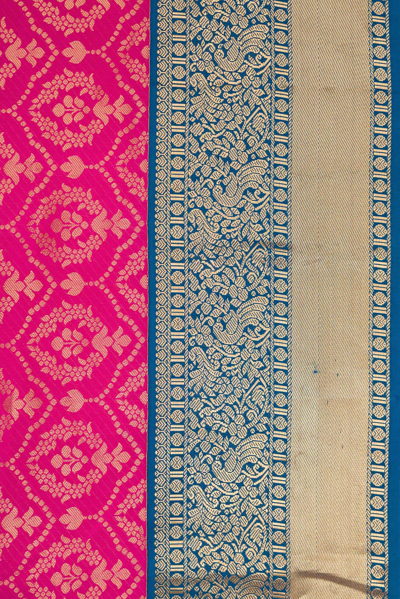 Border image of Magenta Dual Tone Kanjivaram Silk Saree with Zari Brocade on the body and Zari Border. 