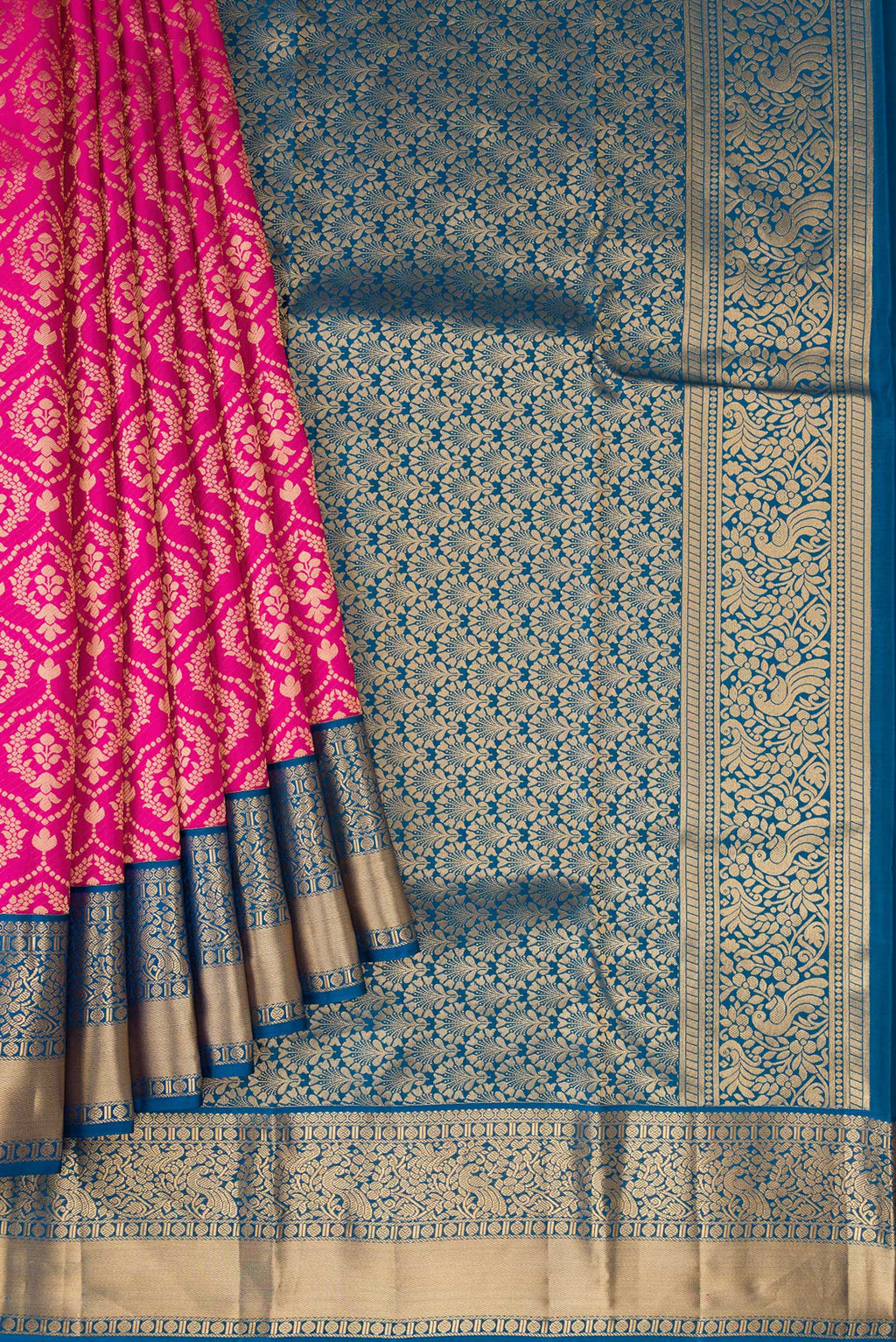 Pleats and pallu of Magenta Dual Tone Kanjivaram Silk Saree with Zari Brocade on the body and Zari Border. 