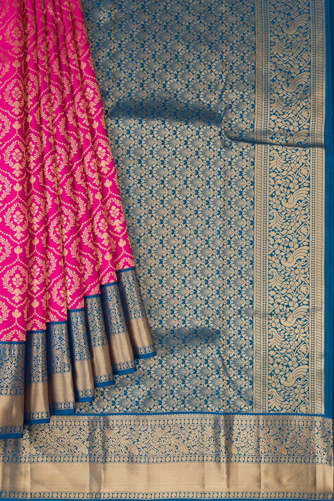Pleats and pallu of Magenta Dual Tone Kanjivaram Silk Saree with Zari Brocade on the body and Zari Border. 