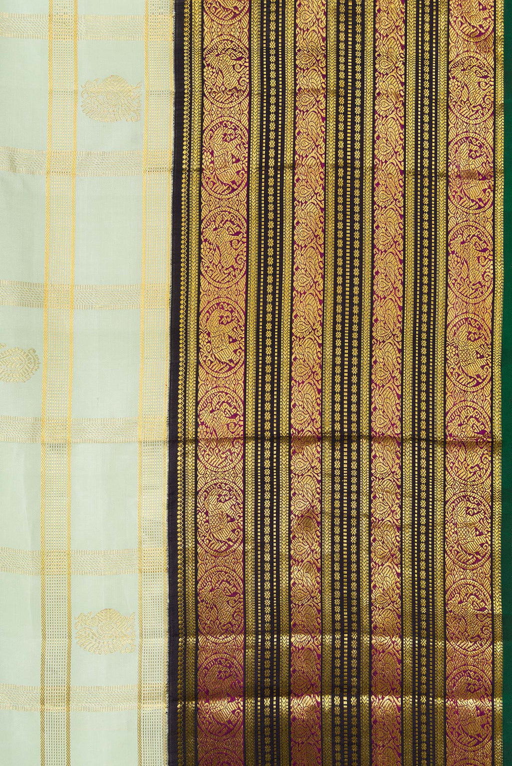 Border image of Pista Green Dual Tone Kanchipuram Silk Saree with Checked design on the body and Zari Border. 