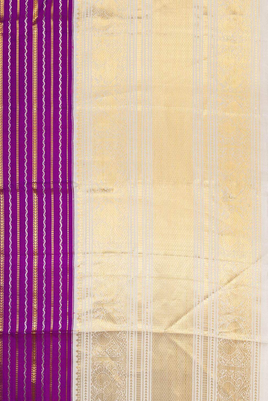 Border image of Magenta Dual Tone Kanchipuram Silk Saree with Stripes on the body and Zari Border. 