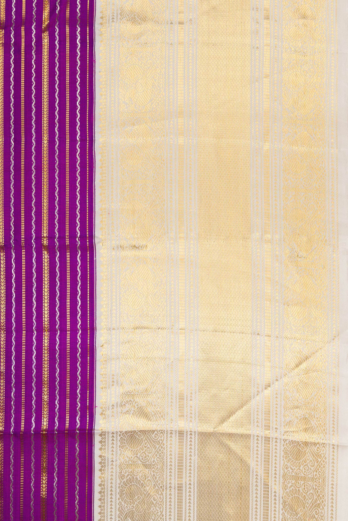 Border image of Magenta Dual Tone Kanchipuram Silk Saree with Stripes on the body and Zari Border. 