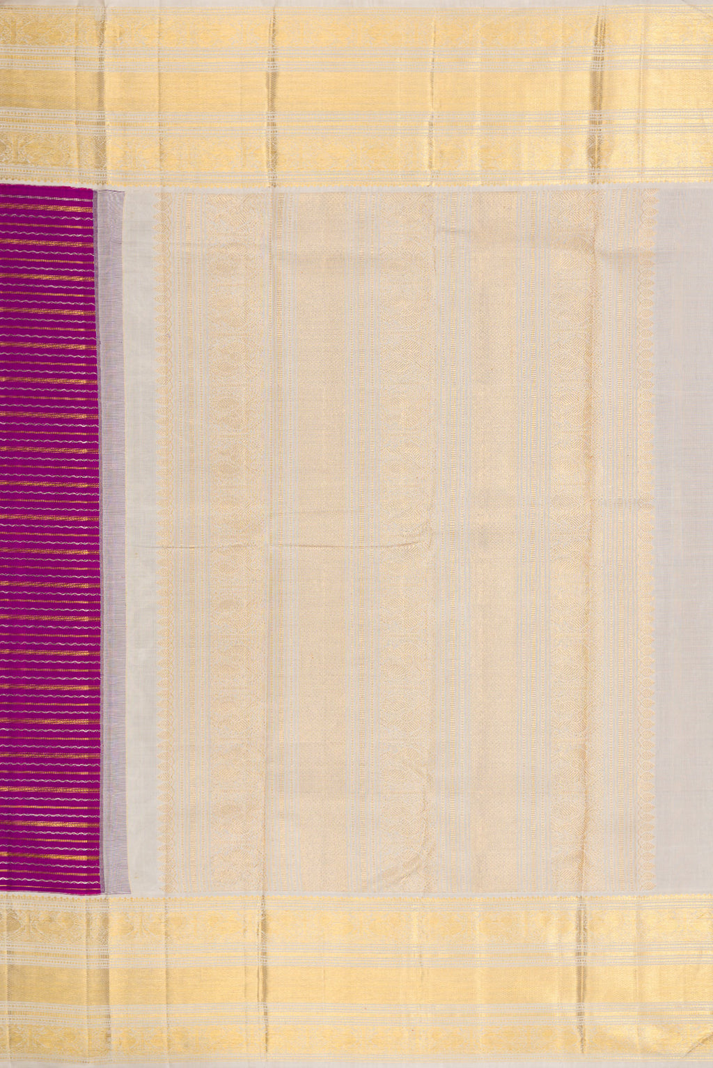 Close up image of the pallu of Magenta Dual Tone Kanchipuram Silk Saree with Stripes on the body and Zari Border. 