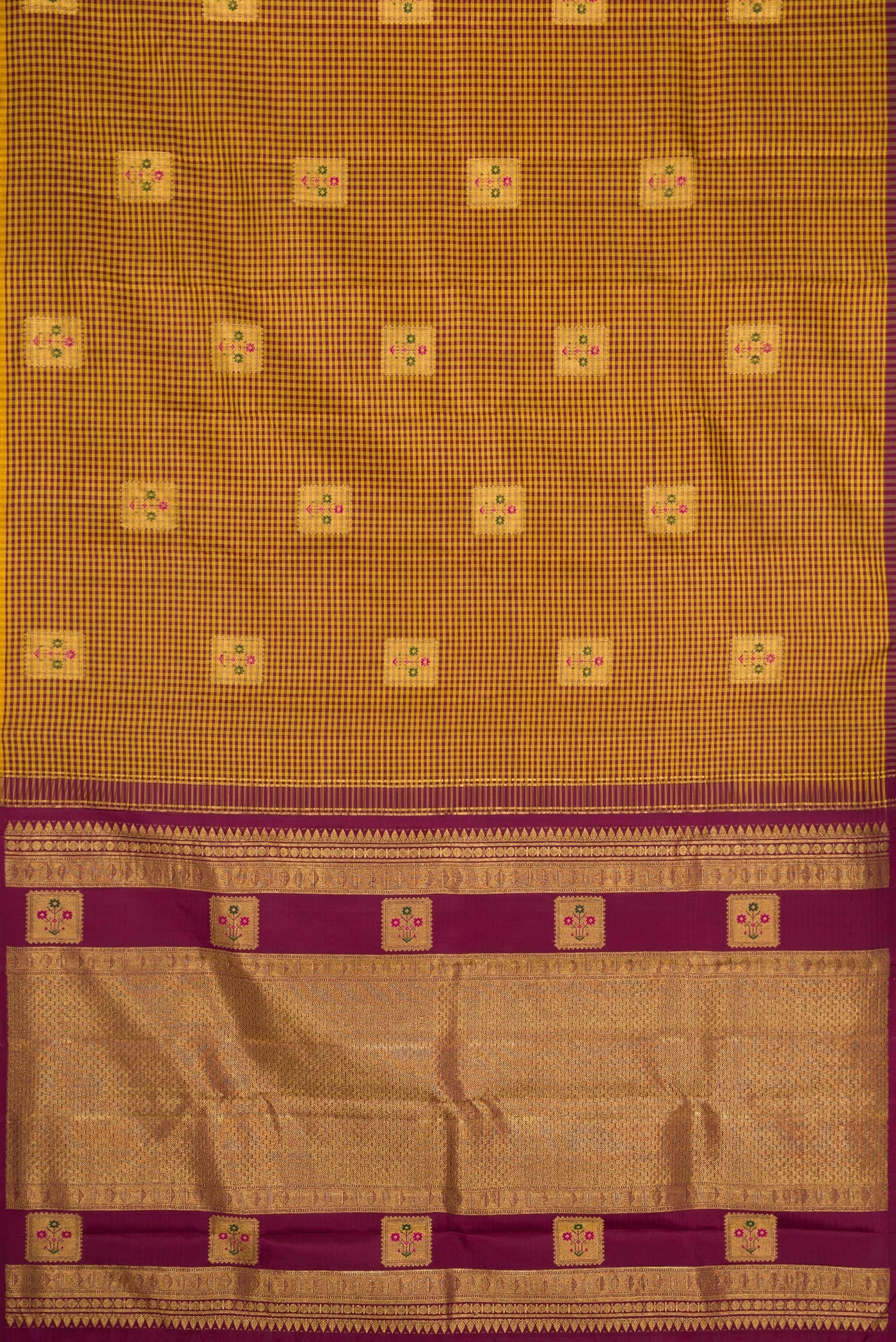 Flat view of Mustard Dual Tone Kanjivaram Silk Saree with Checked design on the body and Without Border. 