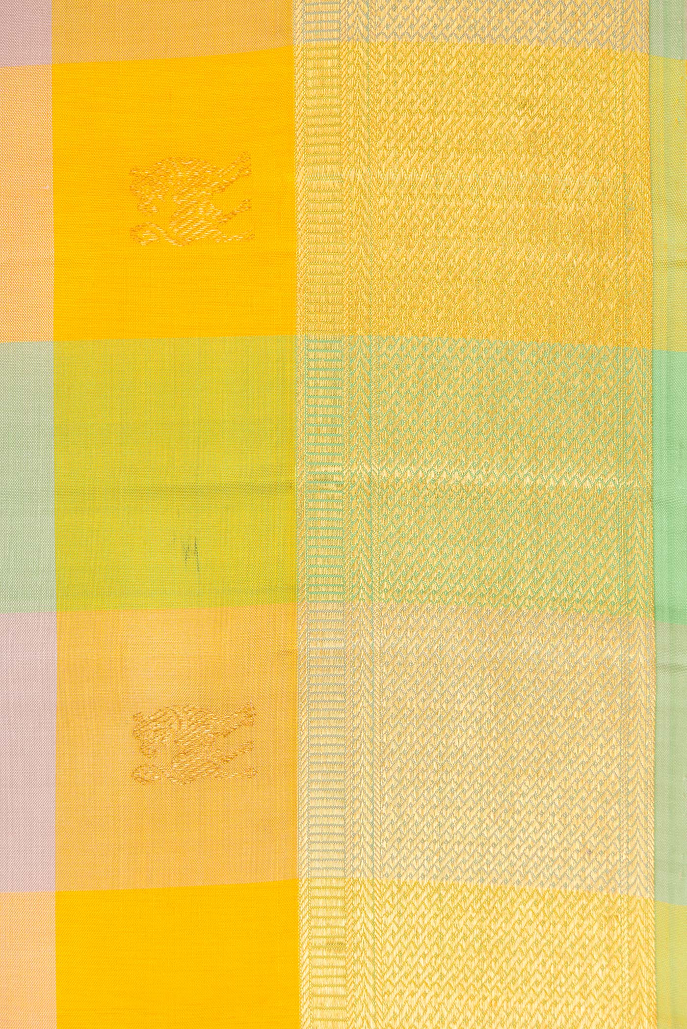 Border image of Yellow , Green and Lilac Color Kanchipuram Silk Saree with Checked design on the body and Zari Border. 