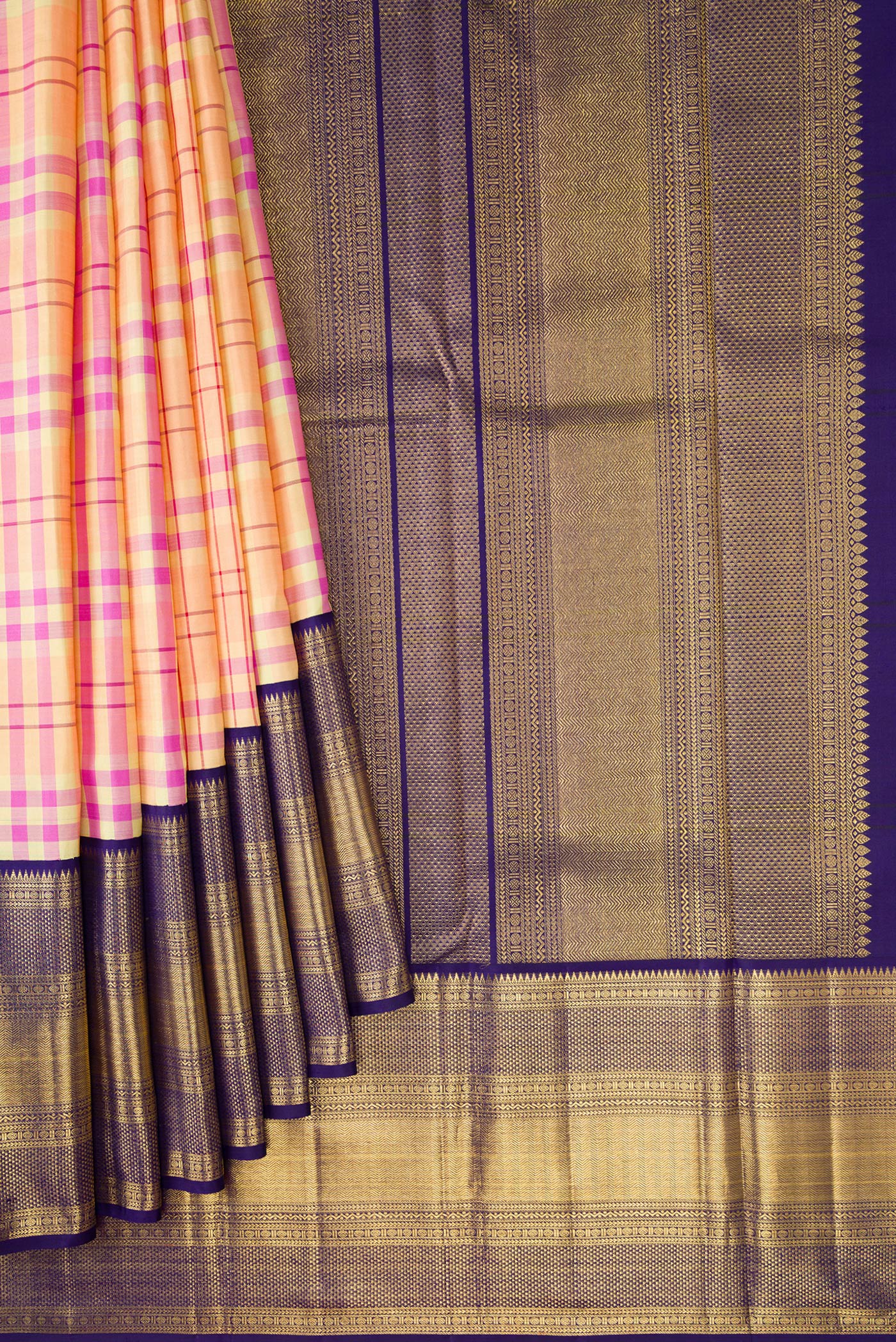 Pleats and pallu of Pure Silk Pure Zari Peach Dual Tone Kanchipuram Saree with Checked design on the body and Zari Border. 