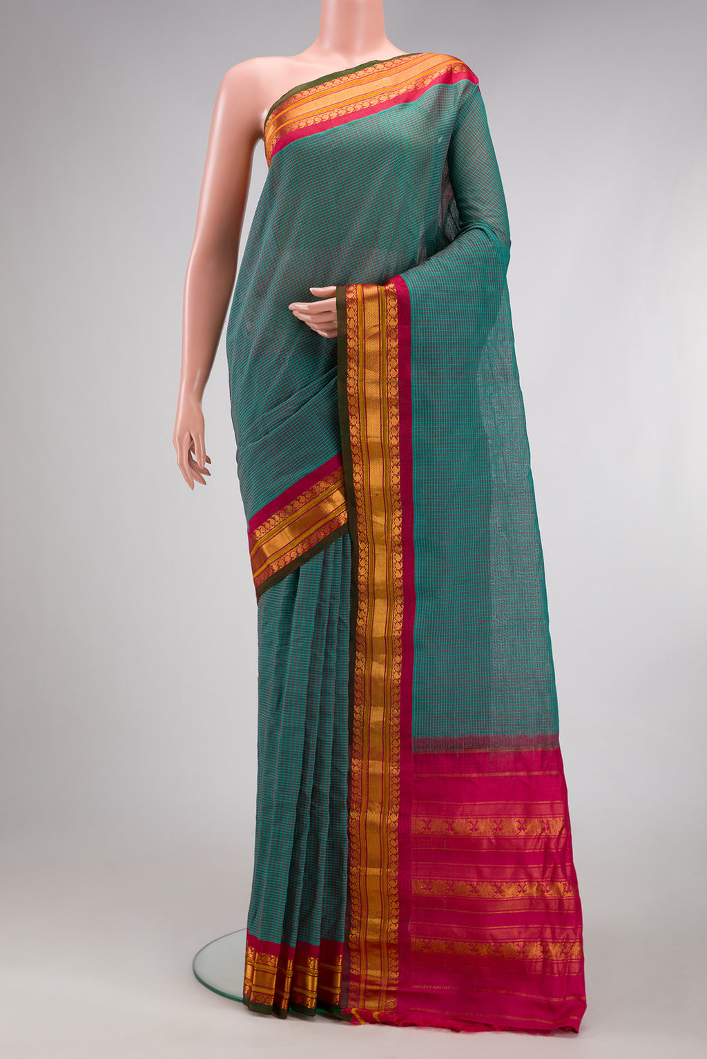 Purple Gadwal Silk Cotton Saree with Checked design on the body and Zari Border.  displayed on a mannequin