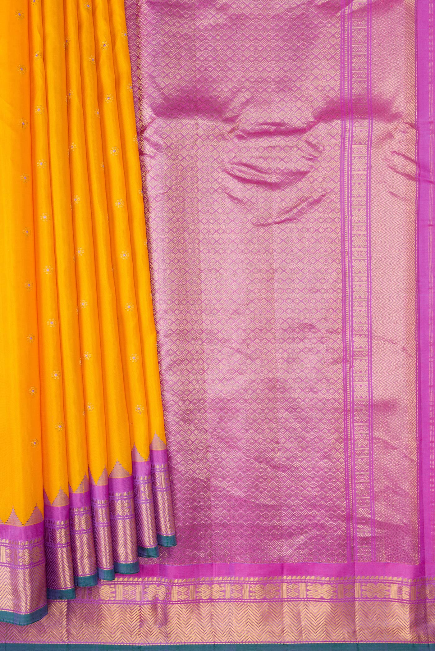 Pleats and pallu of Yellow Dual Tone Gadwal Silk Saree with Zari And Thread Butta on the body and Temple Border. 