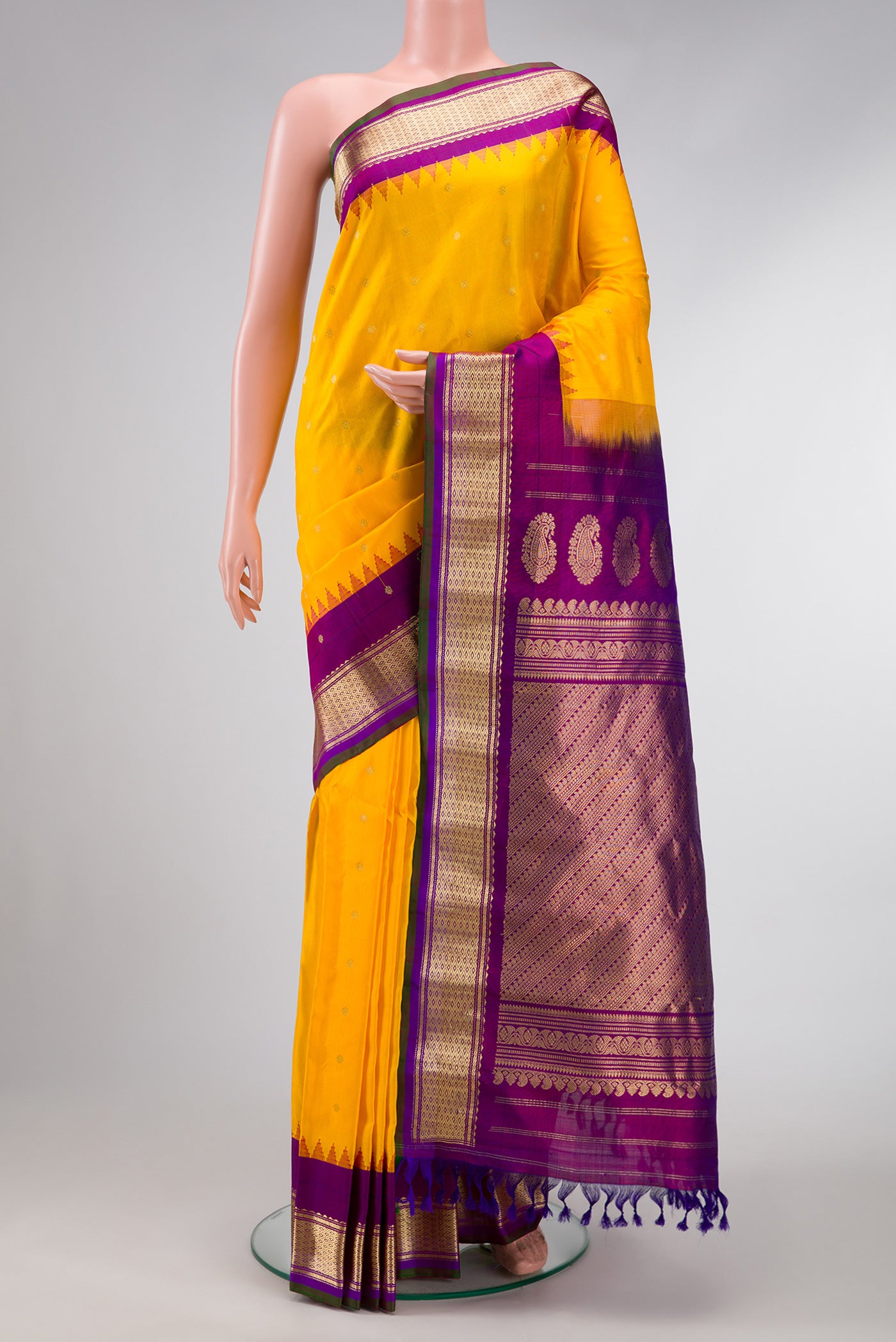 Yellow Dual Tone Gadwal Silk Saree with Zari Butta on the body and Zari Border.  displayed on a mannequin