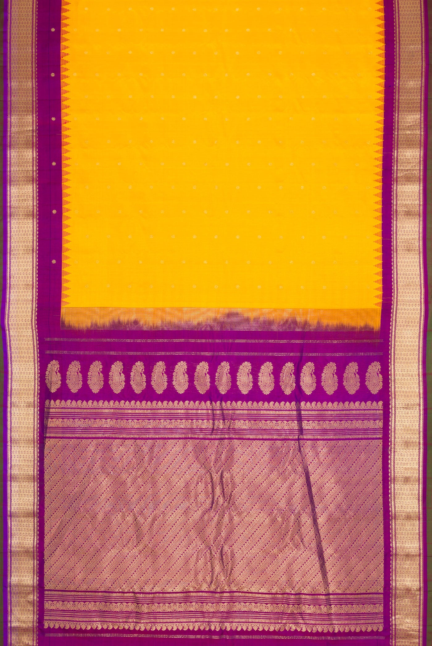 Flat view of Yellow Dual Tone Gadwal Silk Saree with Zari Butta on the body and Zari Border. 