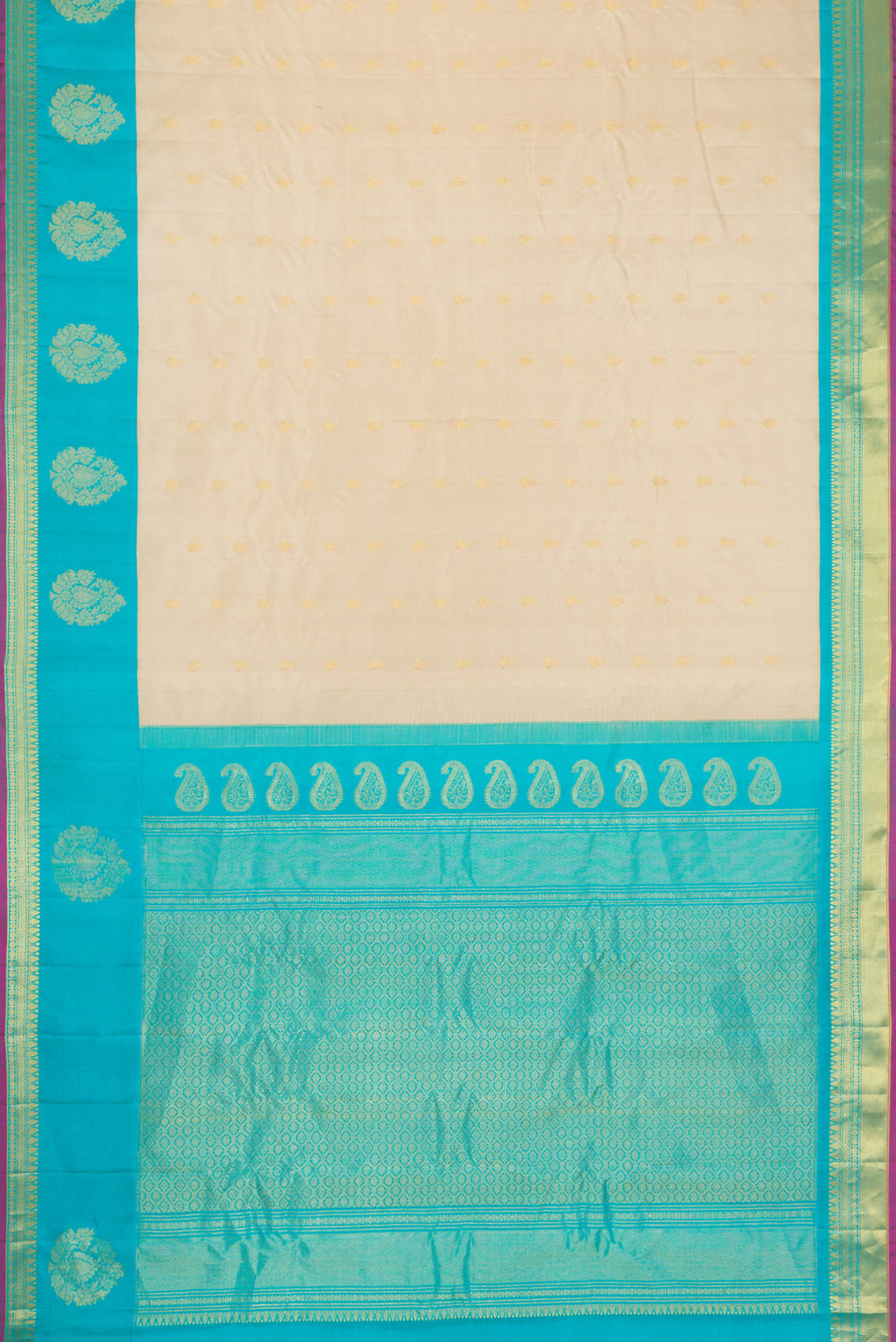 Flat view of Beige Dual Tone Gadwal Silk Saree with Zari Butta on the body and Fancy Border. 