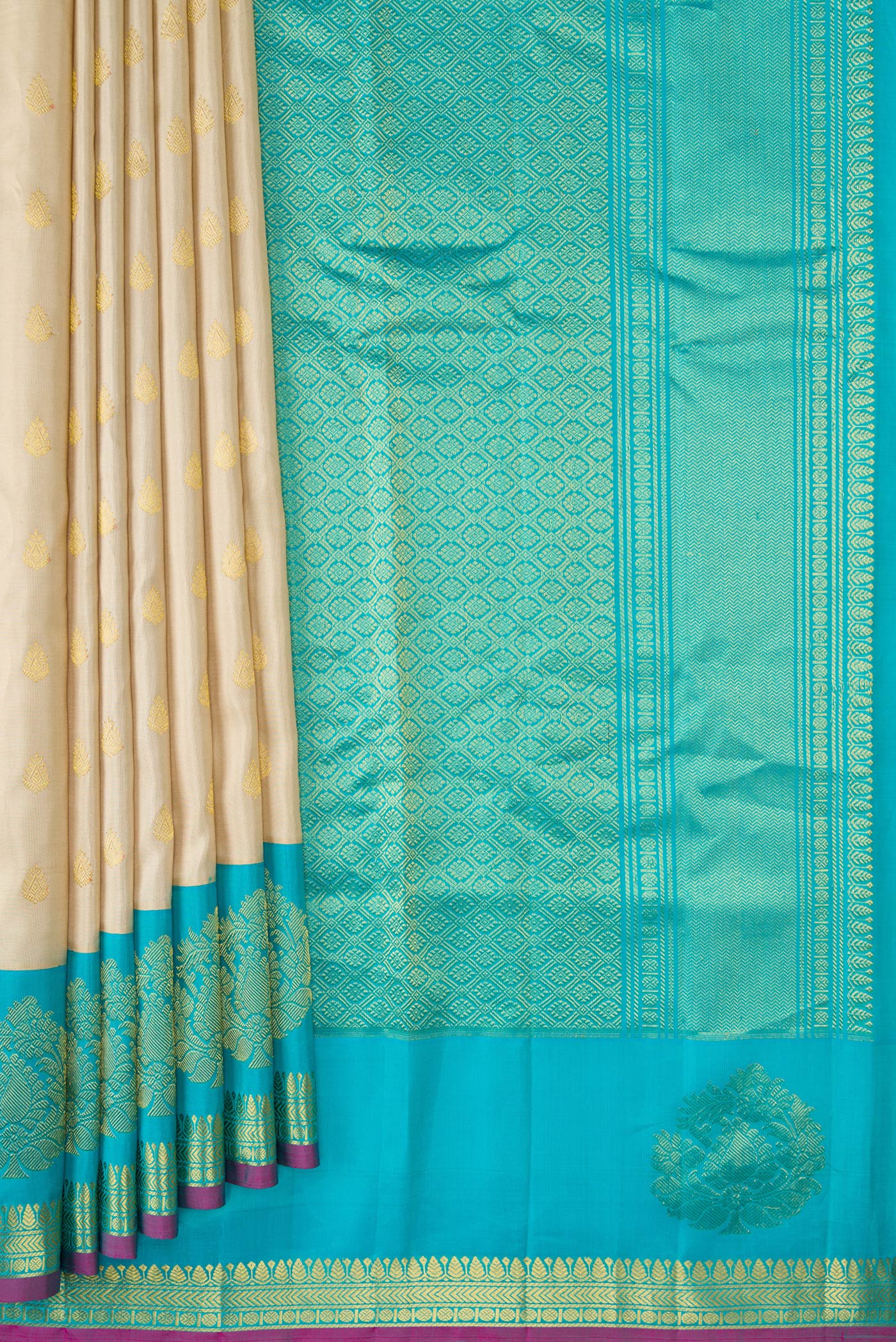 Pleats and pallu of Beige Dual Tone Gadwal Silk Saree with Zari Butta on the body and Fancy Border. 