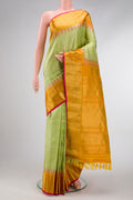 Pista Green Dual Tone Gadwal Silk Saree with Zari Butta on the body and Temple Border.  displayed on a mannequin