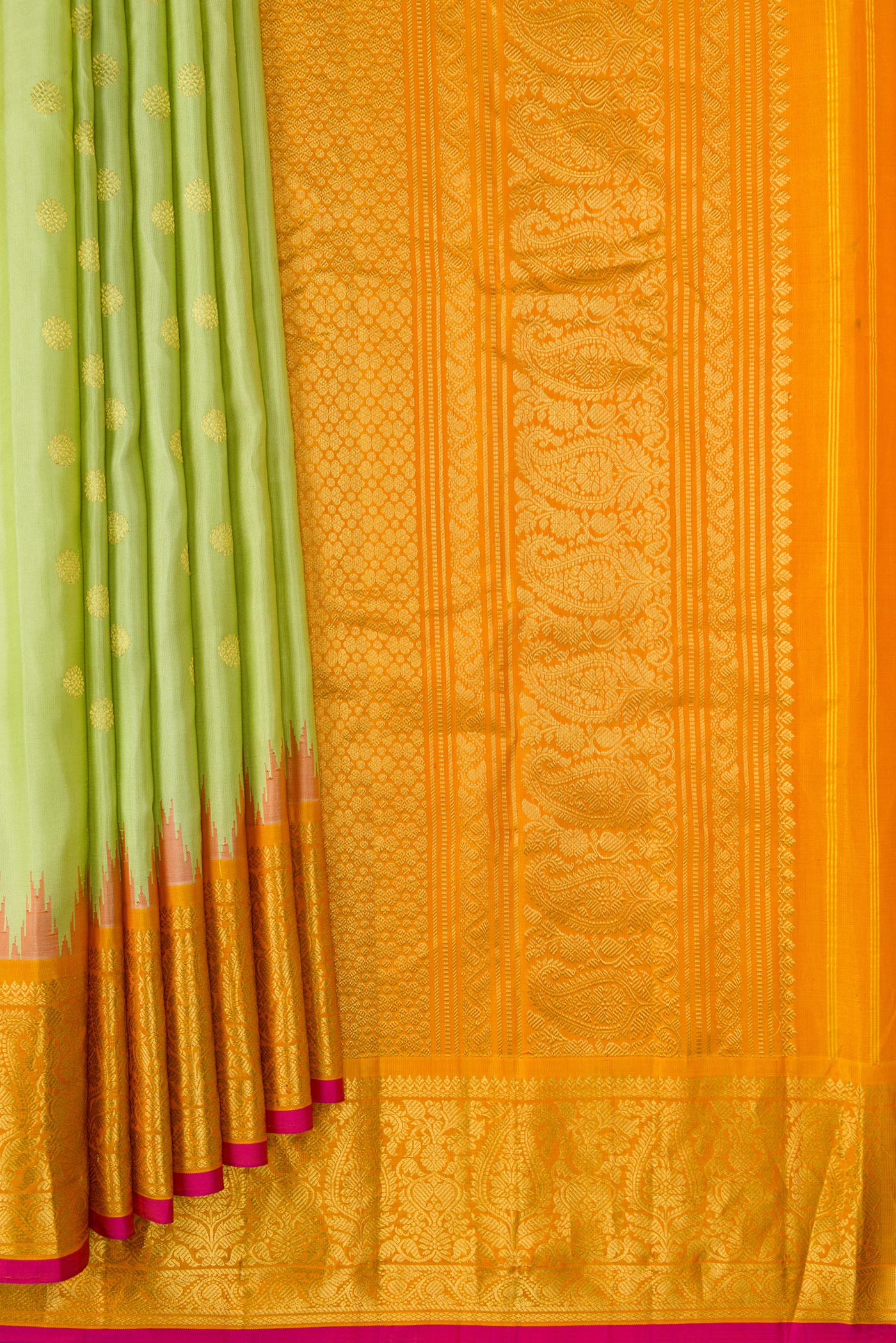 Pleats and pallu of Pista Green Dual Tone Gadwal Silk Saree with Zari Butta on the body and Temple Border. 