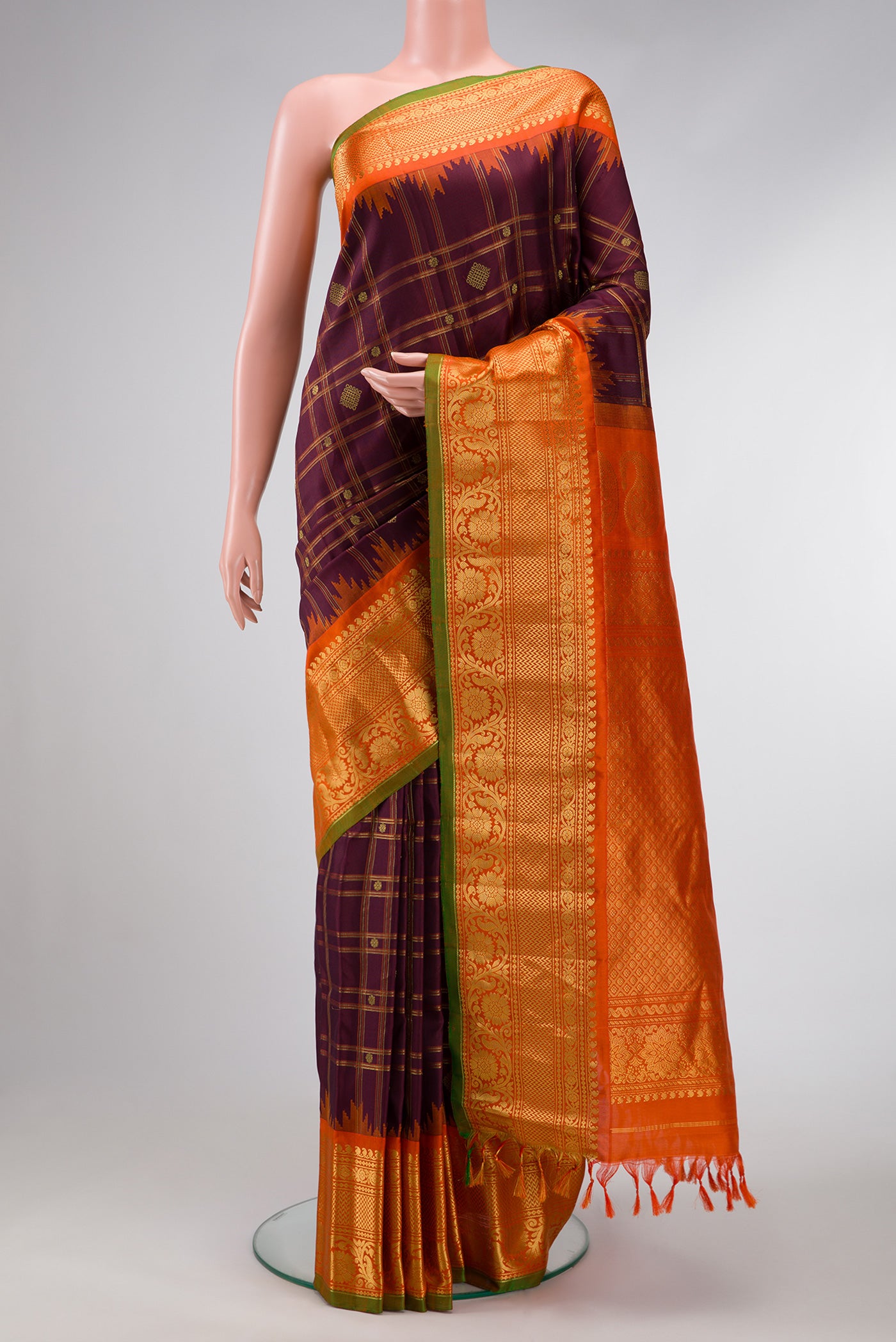 Burgundy Dual Tone Gadwal Silk Saree with Checked design on the body and Zari Border.  displayed on a mannequin