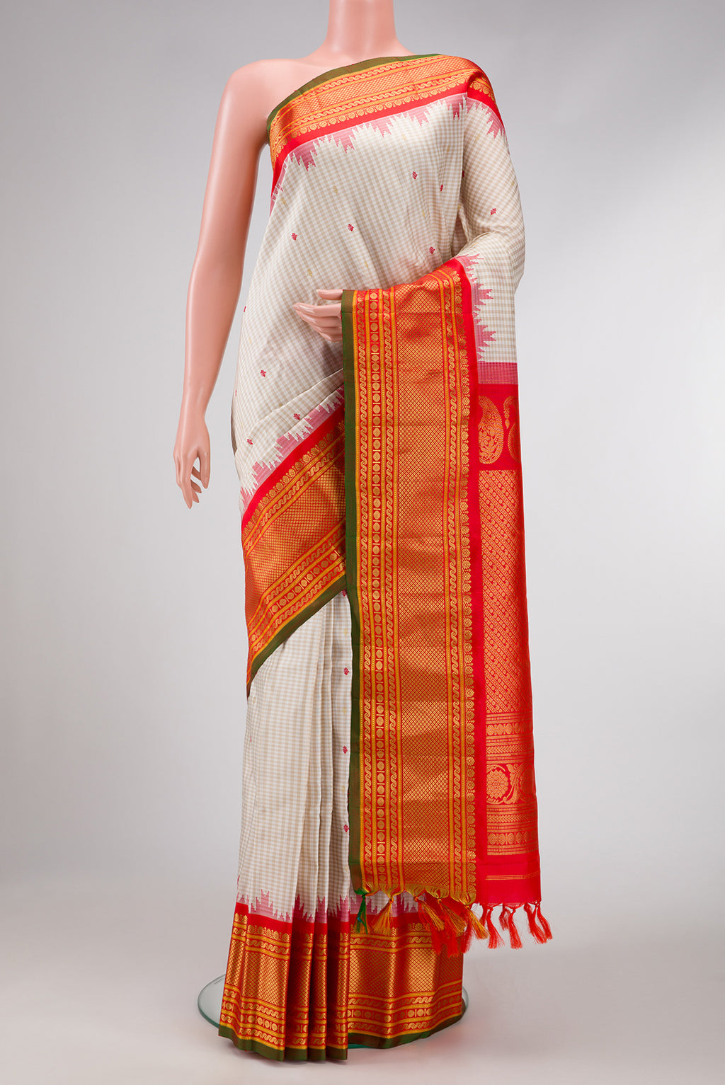 Beige Dual Tone Gadwal Silk Saree with Checked design on the body and Temple Border.  displayed on a mannequin