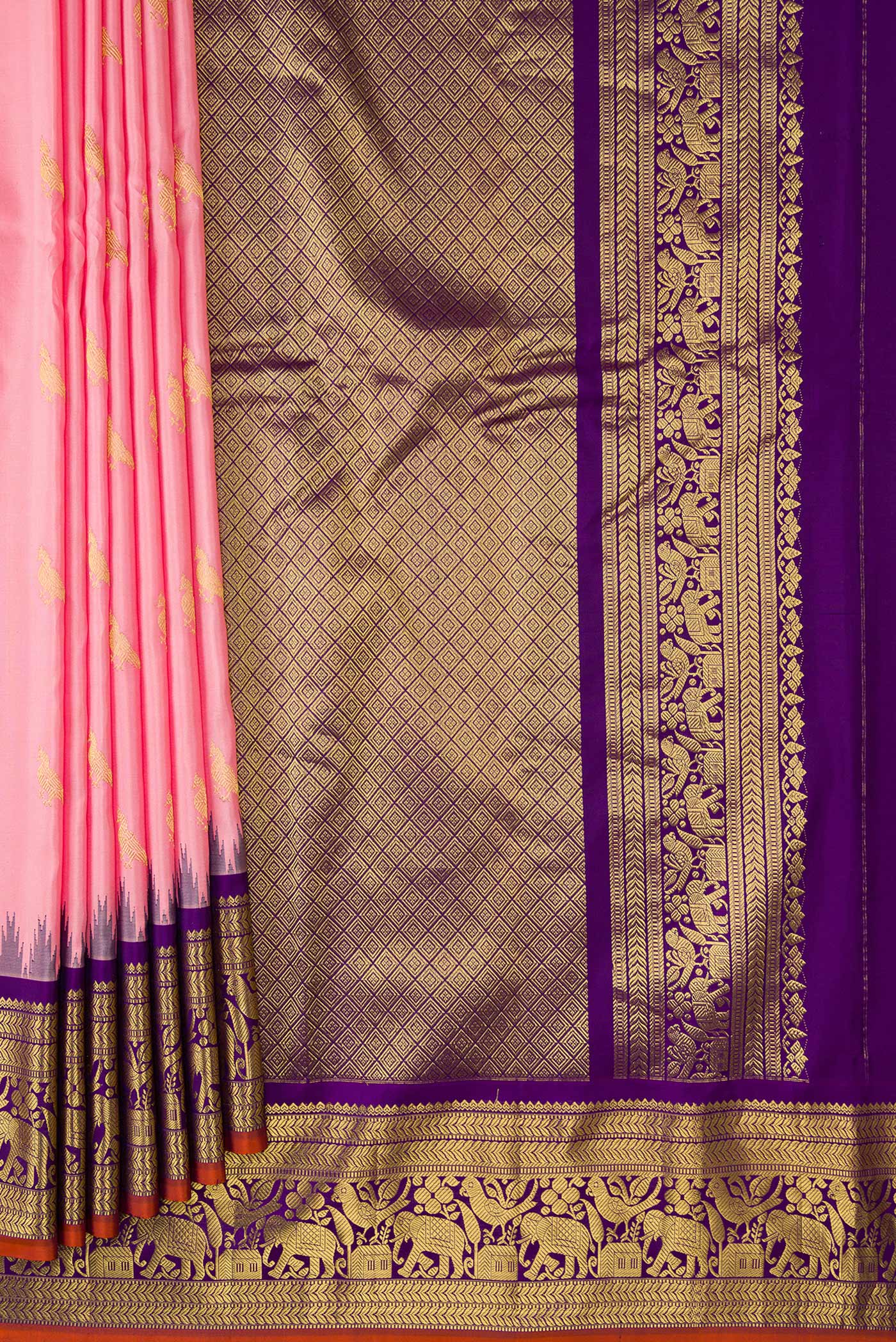 Pleats and pallu of Pink Dual Tone Gadwal Silk Saree with Zari Butta on the body and Zari Border. 