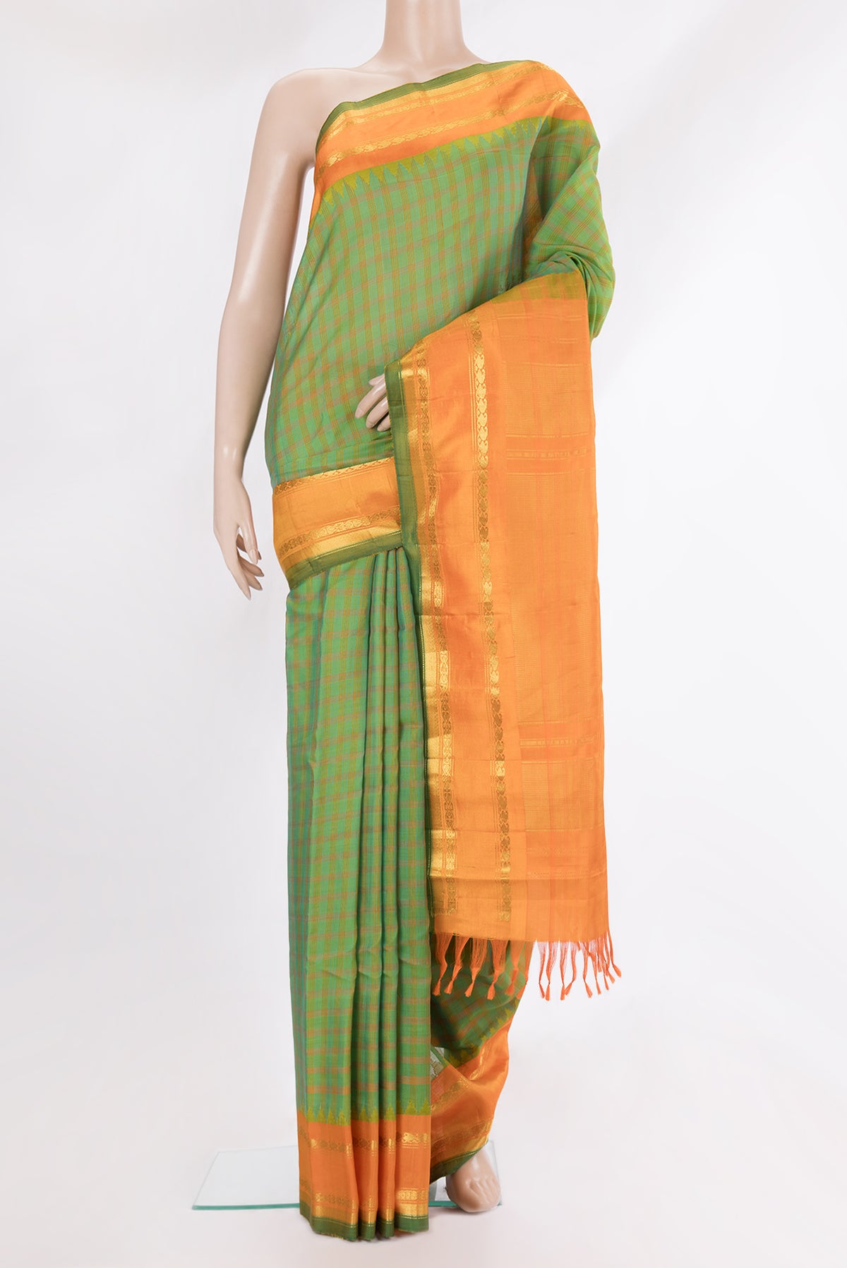 Pure Silk Green Dual Tone Gadwal Saree with Checked design on the body and Zari Border.  displayed on a mannequin