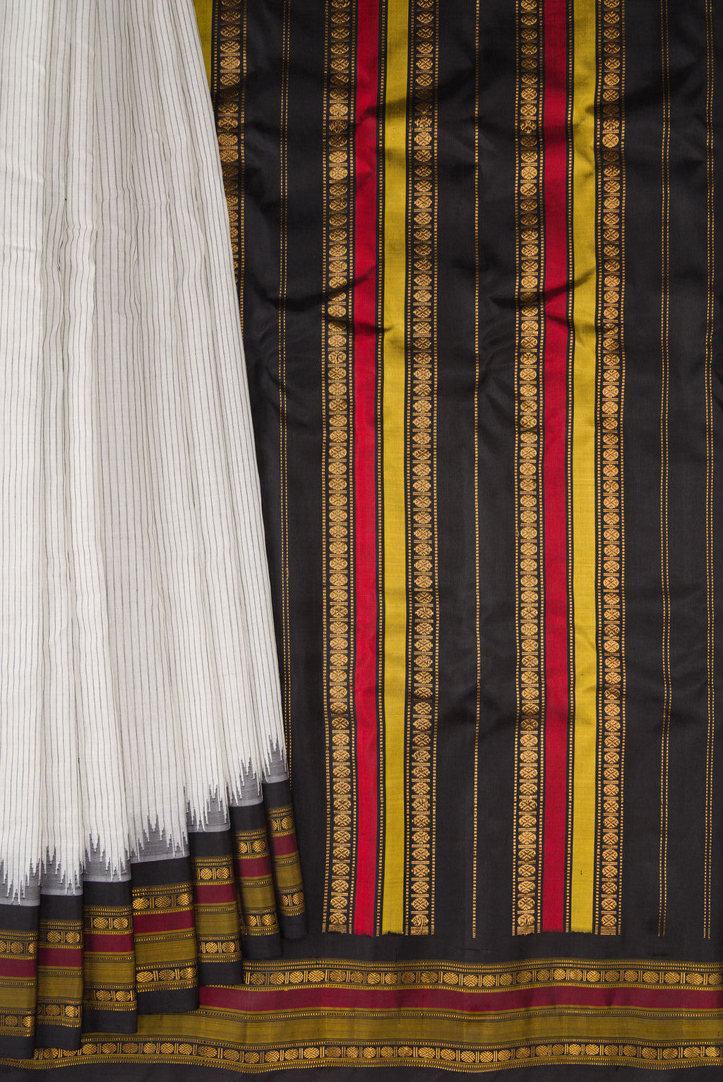 Pleats and pallu of White Gadwal Silk Cotton Saree with Stripes on the body and Zari Border. 
