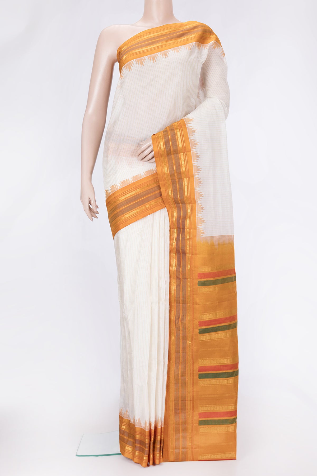 Mustard Dual Tone Gadwal Silk Saree with Stripes on the body and Zari Border.  displayed on a mannequin