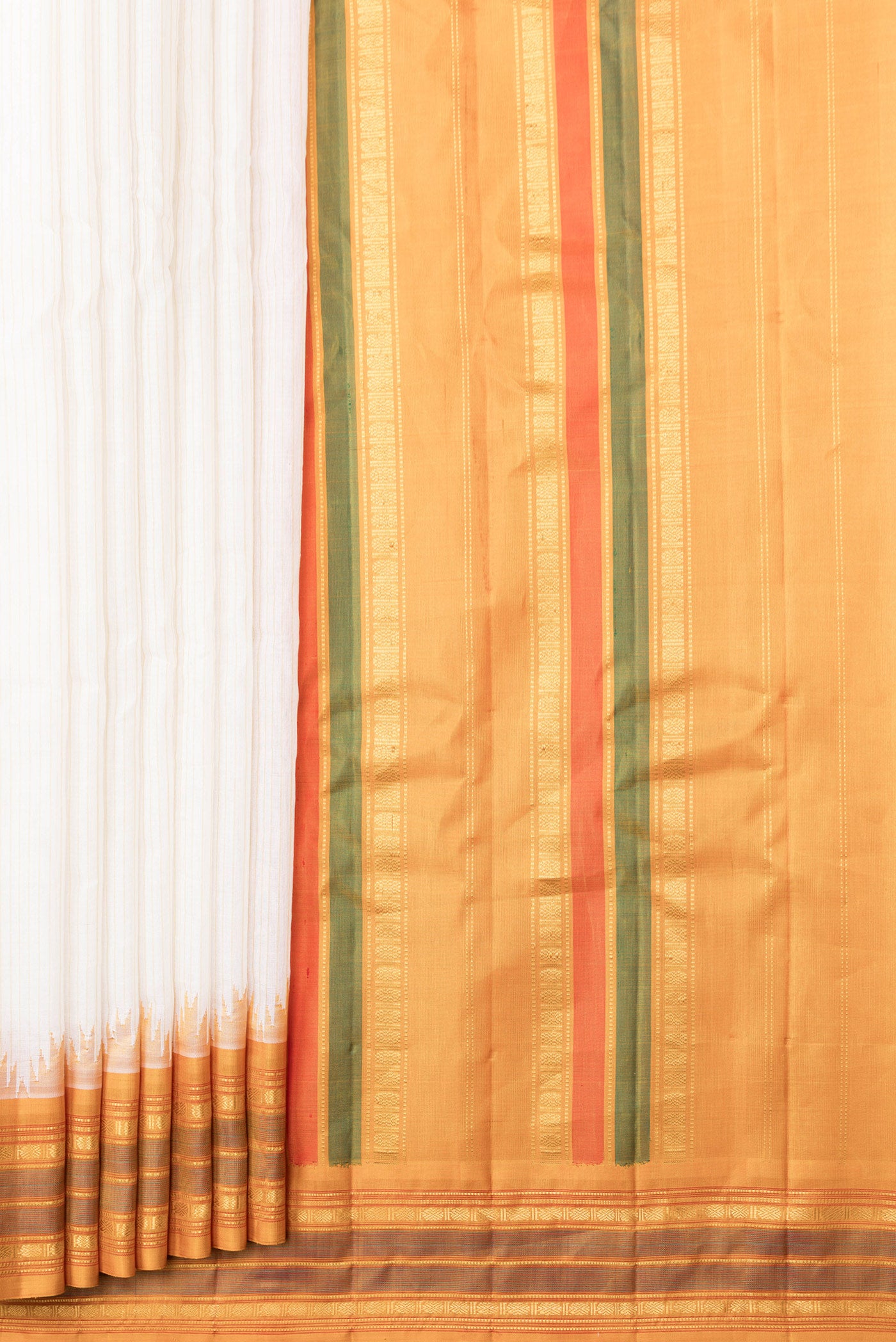 Pleats and pallu of Mustard Dual Tone Gadwal Silk Saree with Stripes on the body and Zari Border. 
