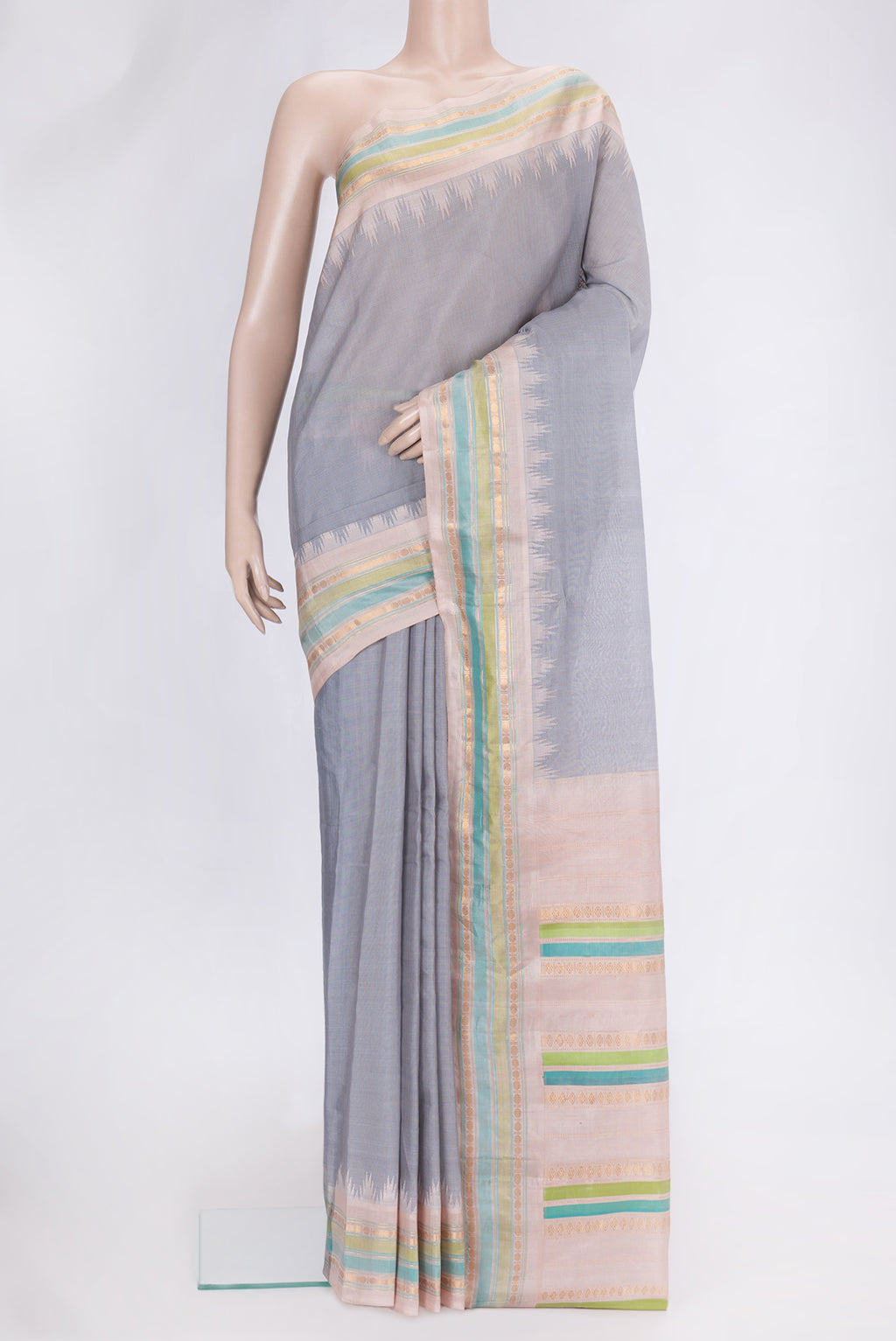 Grey Dual Tone Gadwal Silk Saree with Stripes on the body and Zari Border.  displayed on a mannequin