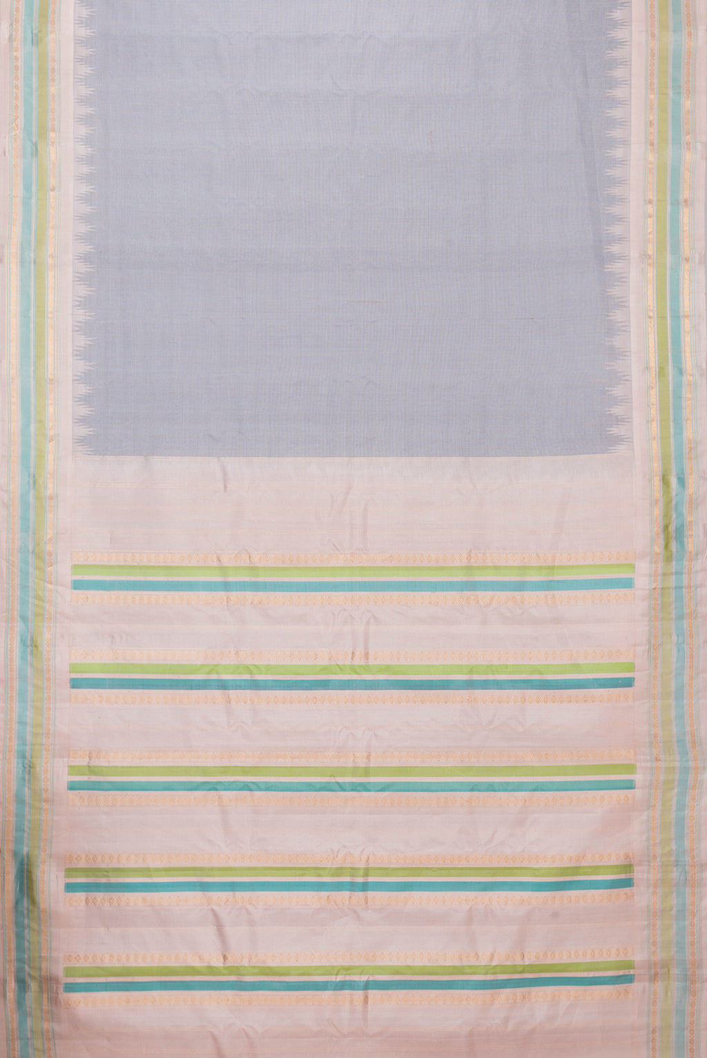 Flat view of Grey Dual Tone Gadwal Silk Saree with Stripes on the body and Zari Border. 