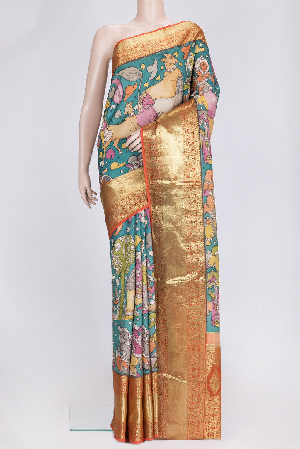 Rose pink Kanchipuram Silk Saree with kalamkari Print on the body and Zari Border.  displayed on a mannequin