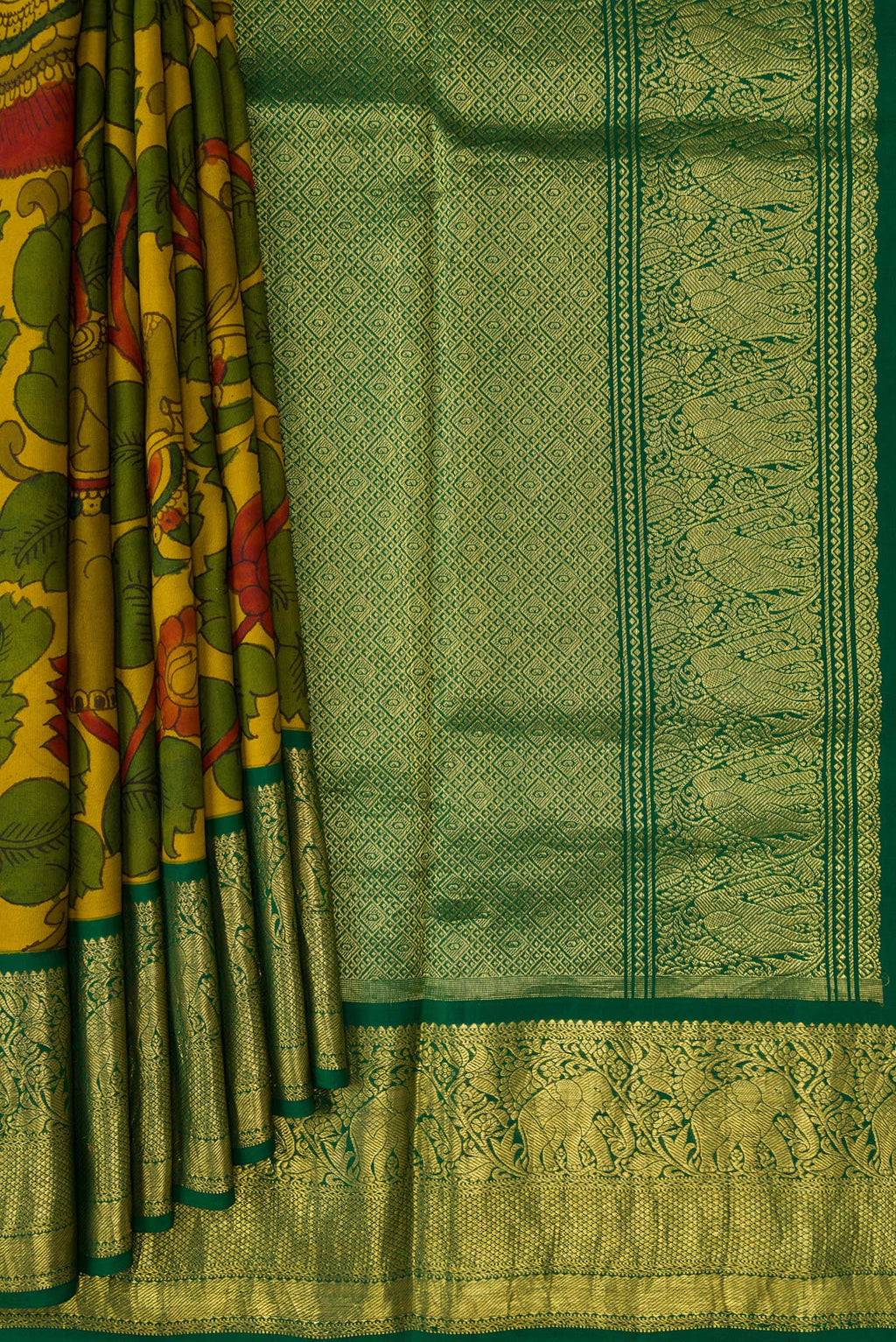 Pleats and pallu of Mehandi Green Dual Tone Kanchipuram Silk Saree with kalamkari Print on the body and Zari Border. 