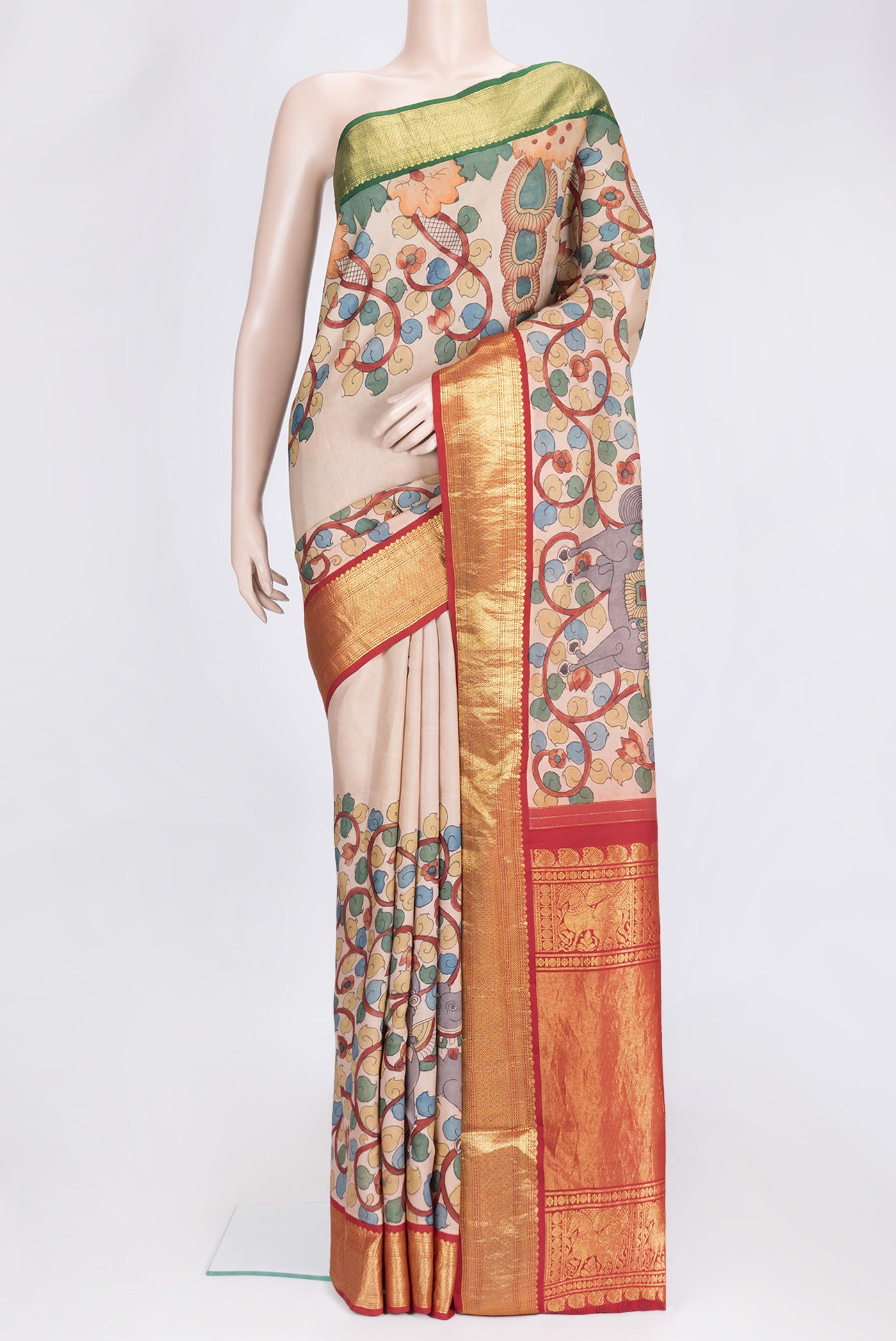 Beige Dual Tone Kanchipuram Silk Saree with kalamkari Print on the body and Zari Border.  displayed on a mannequin