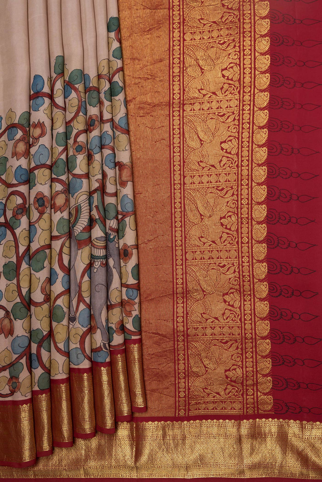 Pleats and pallu of Beige Dual Tone Kanchipuram Silk Saree with kalamkari Print on the body and Zari Border. 