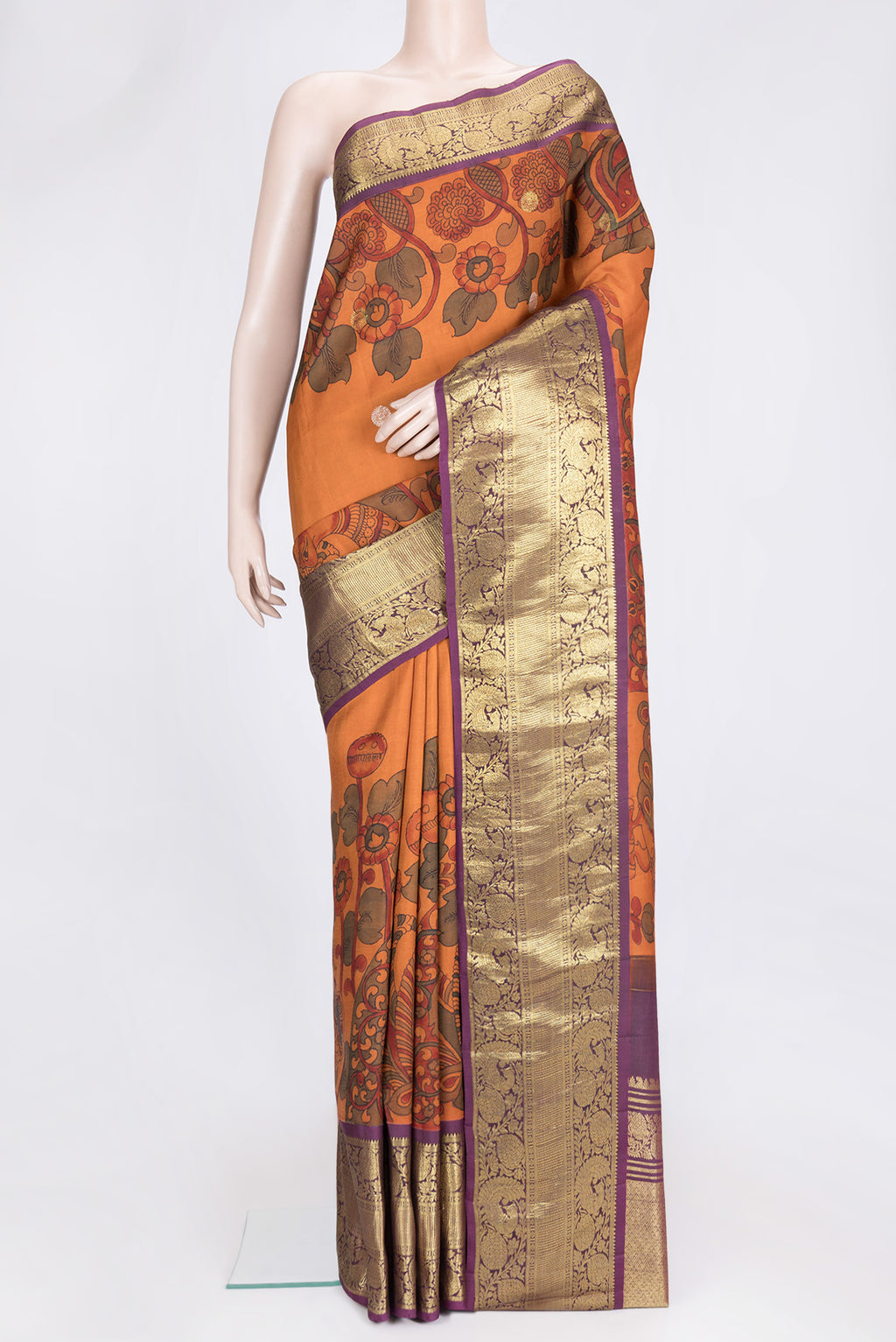 Orange Dual Tone Kanchipuram Silk Saree with kalamkari Print on the body and Zari Border.  displayed on a mannequin