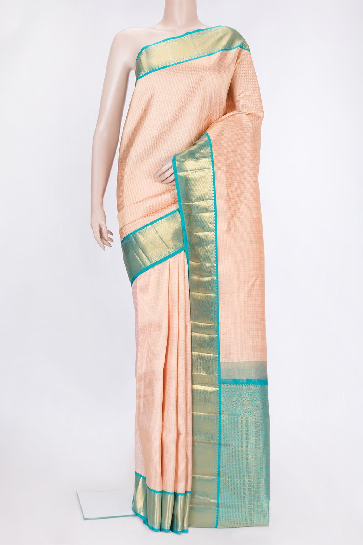 Golden Peach Dual Tone Kanjivaram Silk Saree with Checked design on the body and Zari Border.  displayed on a mannequin