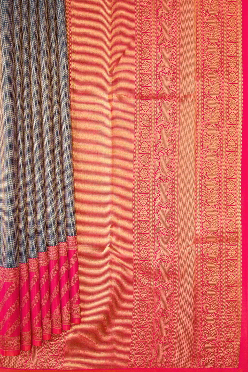 Pleats and pallu of Peacock Blue Dual Tone Kanjivaram Silk Saree with Zari Brocade on the body and Fancy Border. 