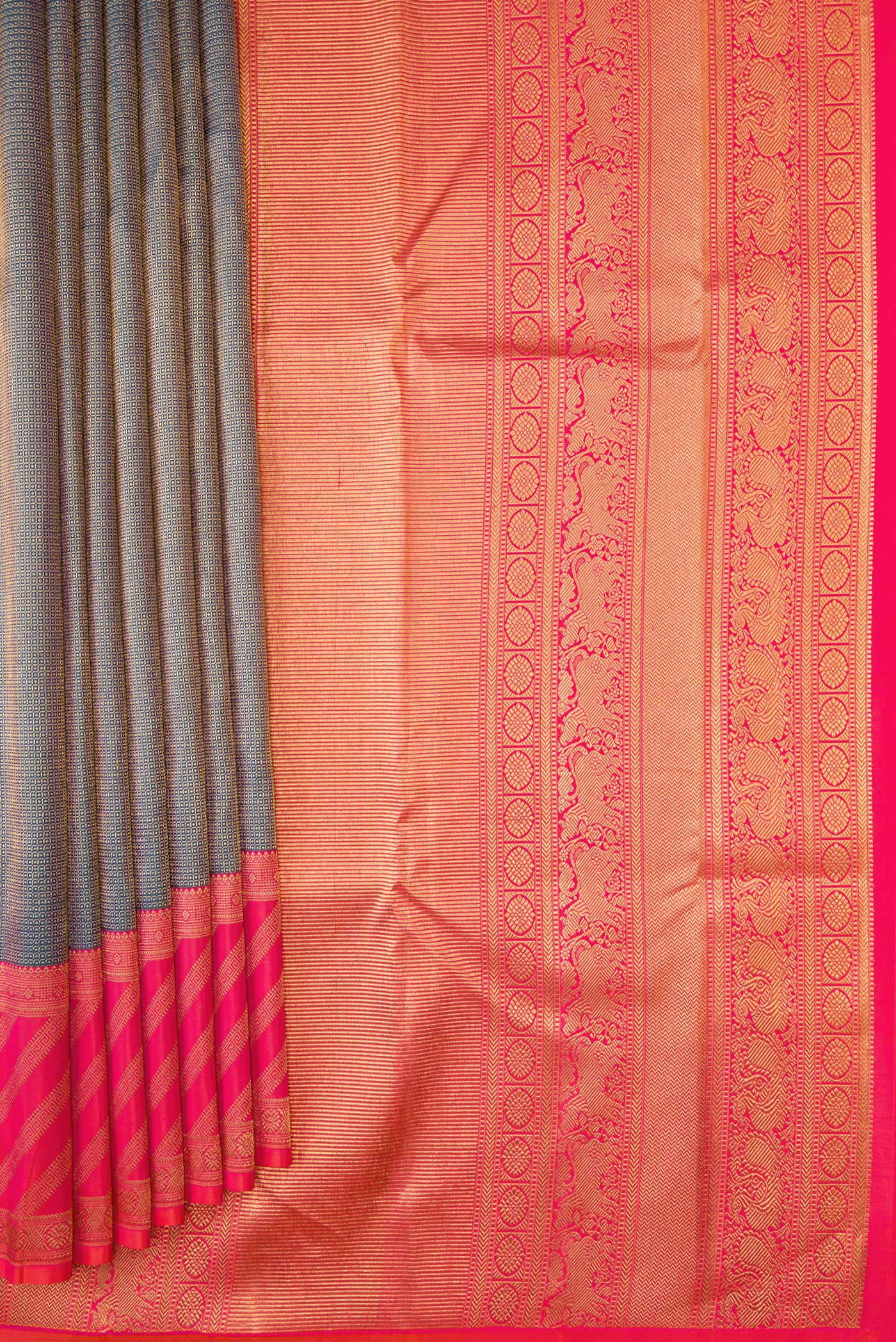 Pleats and pallu of Peacock Blue Dual Tone Kanjivaram Silk Saree with Zari Brocade on the body and Fancy Border. 