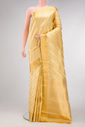 Sandal Dual Tone Kanjivaram Silk Saree with Zari Brocade on the body and Zari Border.  displayed on a mannequin