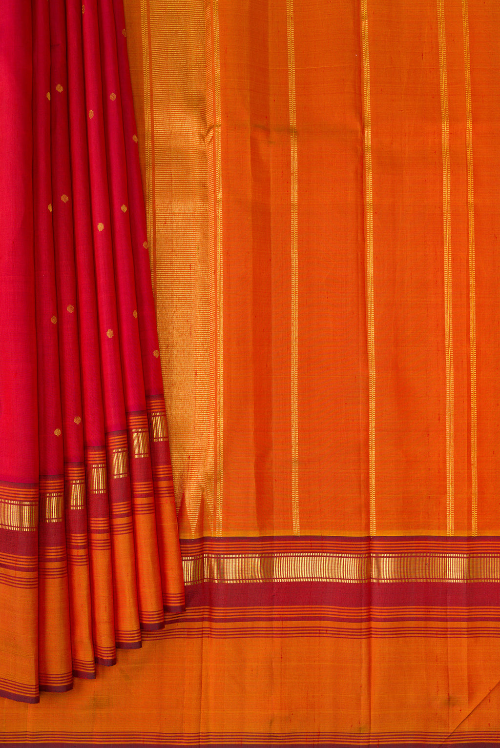 Pleats and pallu of Red Kanchipuram Silk Saree with Zari Butta on the body and Zari Border. 
