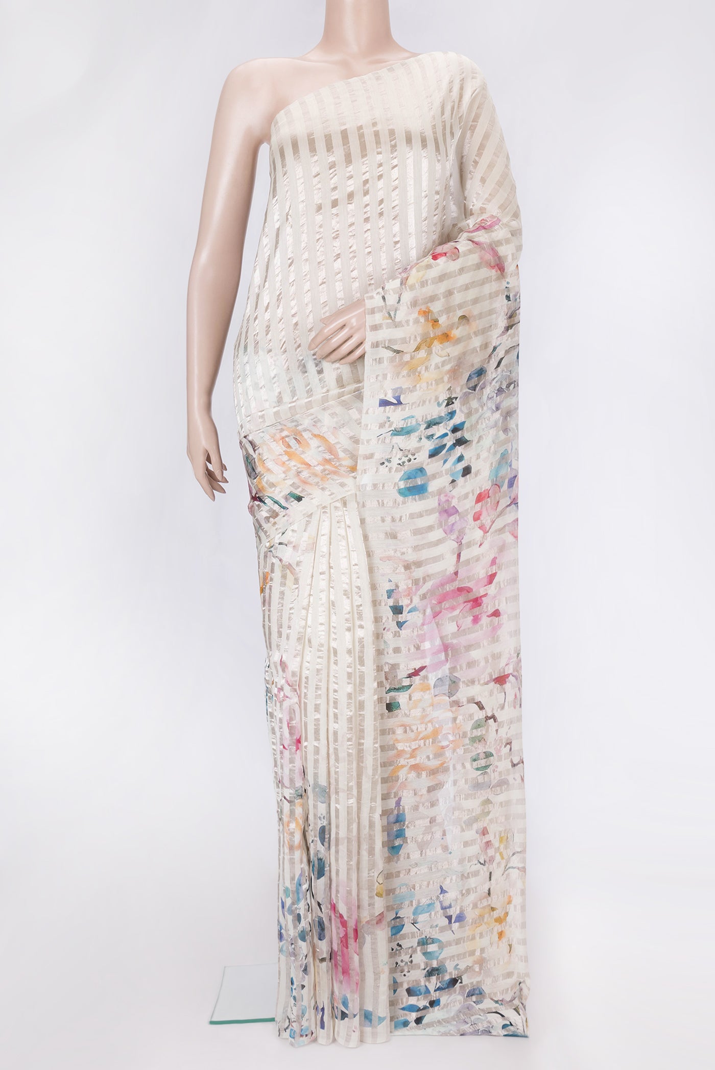 Beige Dual Tone Organza Silk Saree with Printed design on the body and Without Border.  displayed on a mannequin