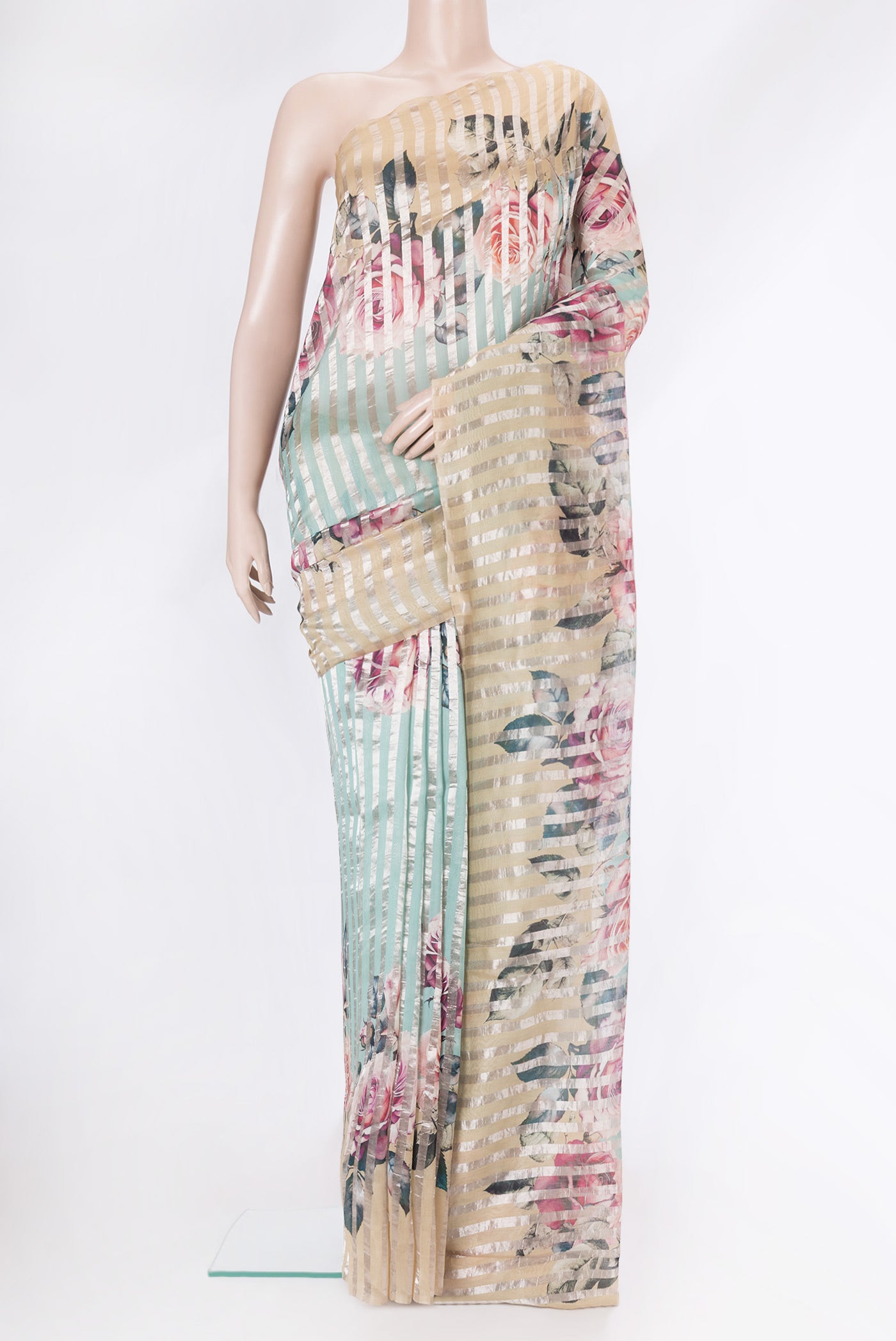 Sky Blue Dual Tone Organza Silk Saree with Stripes on the body and Fancy Border.  displayed on a mannequin