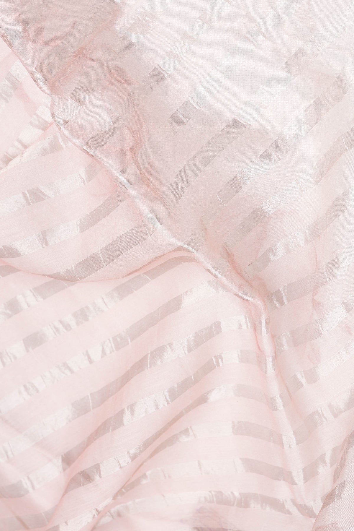 Close up of Multi Color Tussar Silk Saree with Stripes on the body and Zari Border.  displaying folds