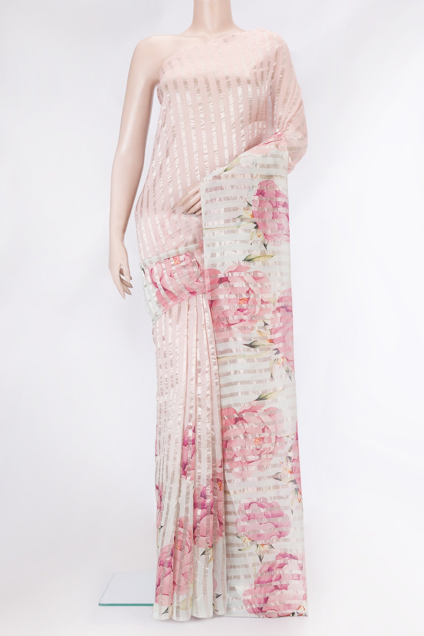 Multi Color Tussar Silk Saree with Stripes on the body and Zari Border.  displayed on a mannequin