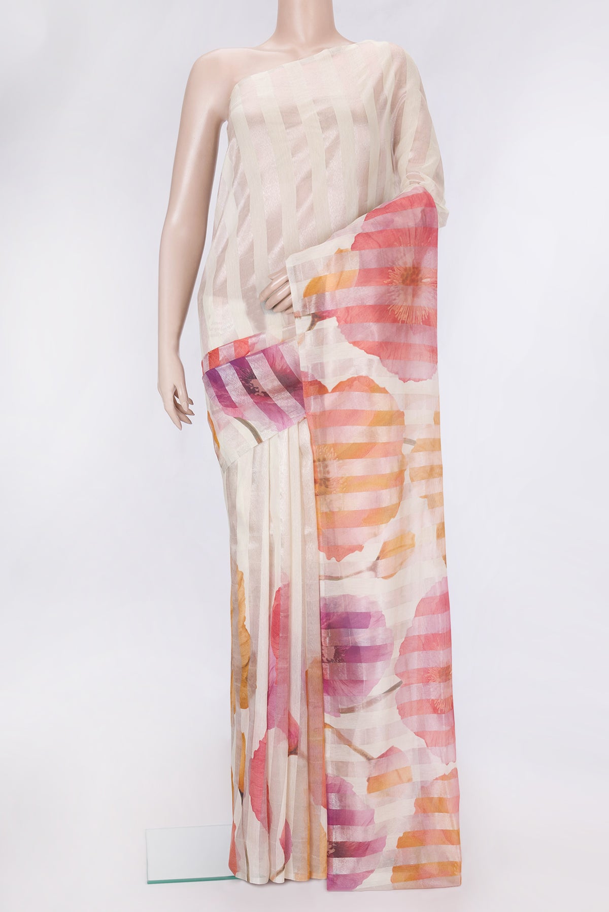 Beige Dual Tone Organza Silk Saree with Printed design on the body and Without Border.  displayed on a mannequin