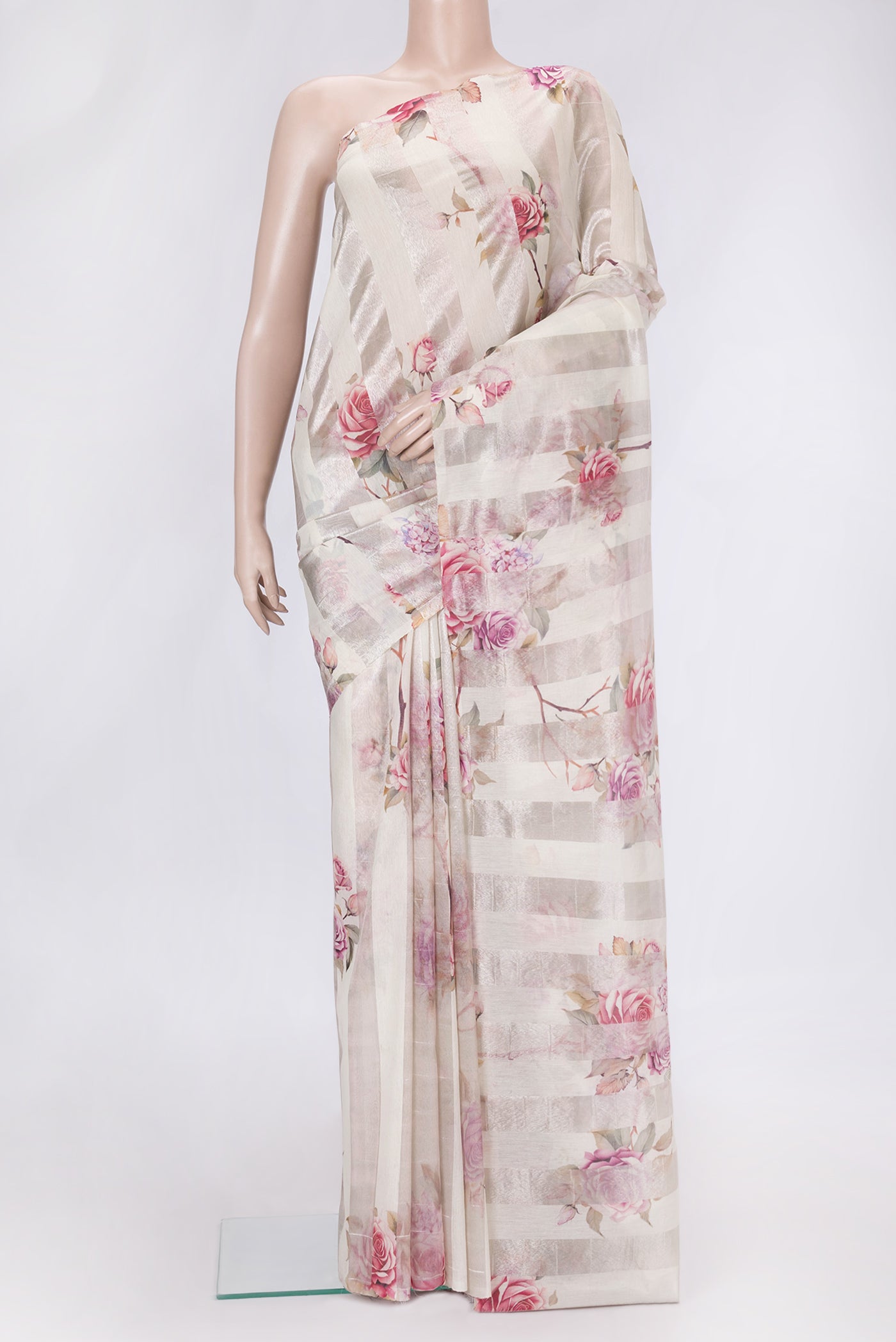 Beige Dual Tone Organza Silk Saree with Printed design on the body and Without Border.  displayed on a mannequin