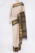 Beige Dual Tone Gadwal Silk Saree with Zari Butta on the body and Zari Border.  displayed on a mannequin